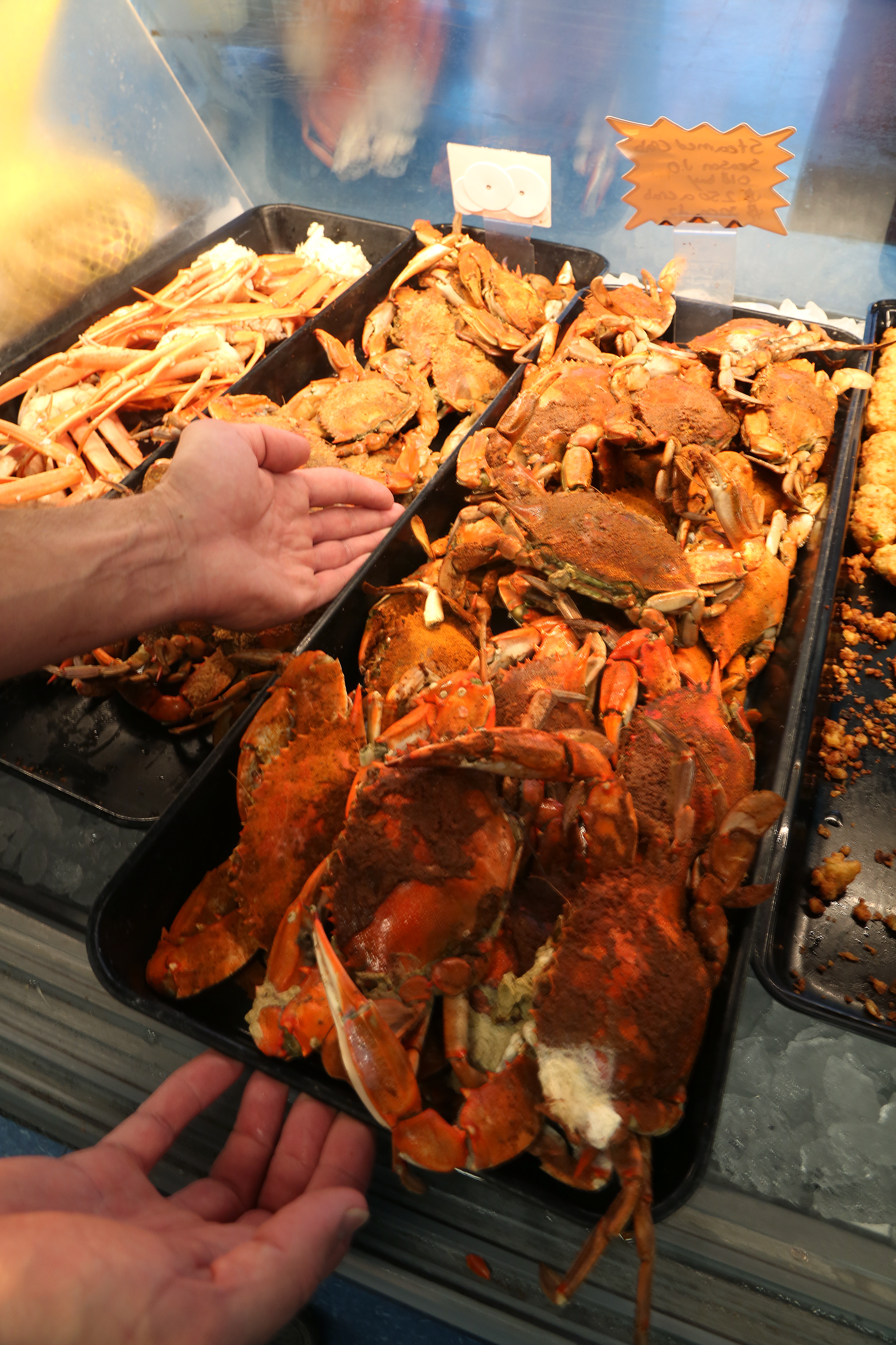 Steamed and seasoned blue crabs are placed in the display case at Key West Seafood Company, Gulfport, Wednesday, October 2, 2019. SCOTT KEELER | Times Steamed and seasoned blue crabs are placed in the display case at Key West Seafood Company, Gulfport, Wednesday, October 2, 2019. SCOTT KEELER | Times