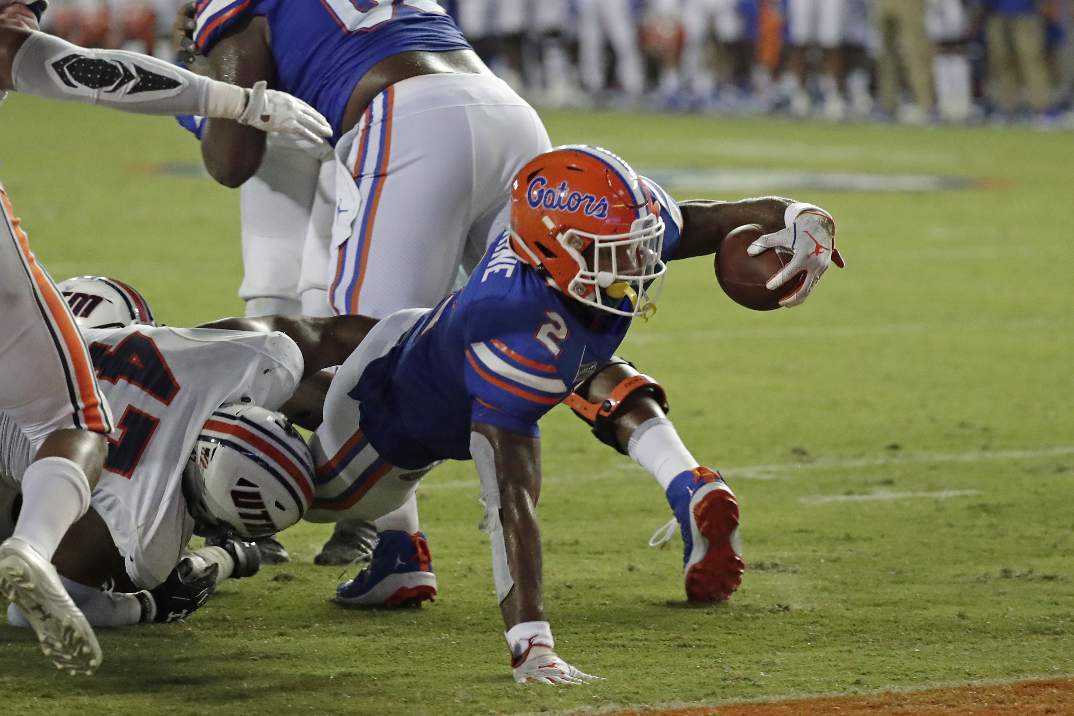 Florida running back Lamical Perine, right, dives over the goal line for a touchdown against UT Martin on a 5-yard run during the second half of an NCAA college football game, Saturday, Sept. 7, 2019, in Gainesville, Fla. (AP Photo/John Raoux) John Raoux | AP Florida running back Lamical Perine, right, dives over the goal line for a touchdown against UT Martin on a 5-yard run during the second half of an NCAA college football game, Saturday, Sept. 7, 2019, in Gainesville, Fla. (AP Photo/John Raoux) John Raoux | AP
