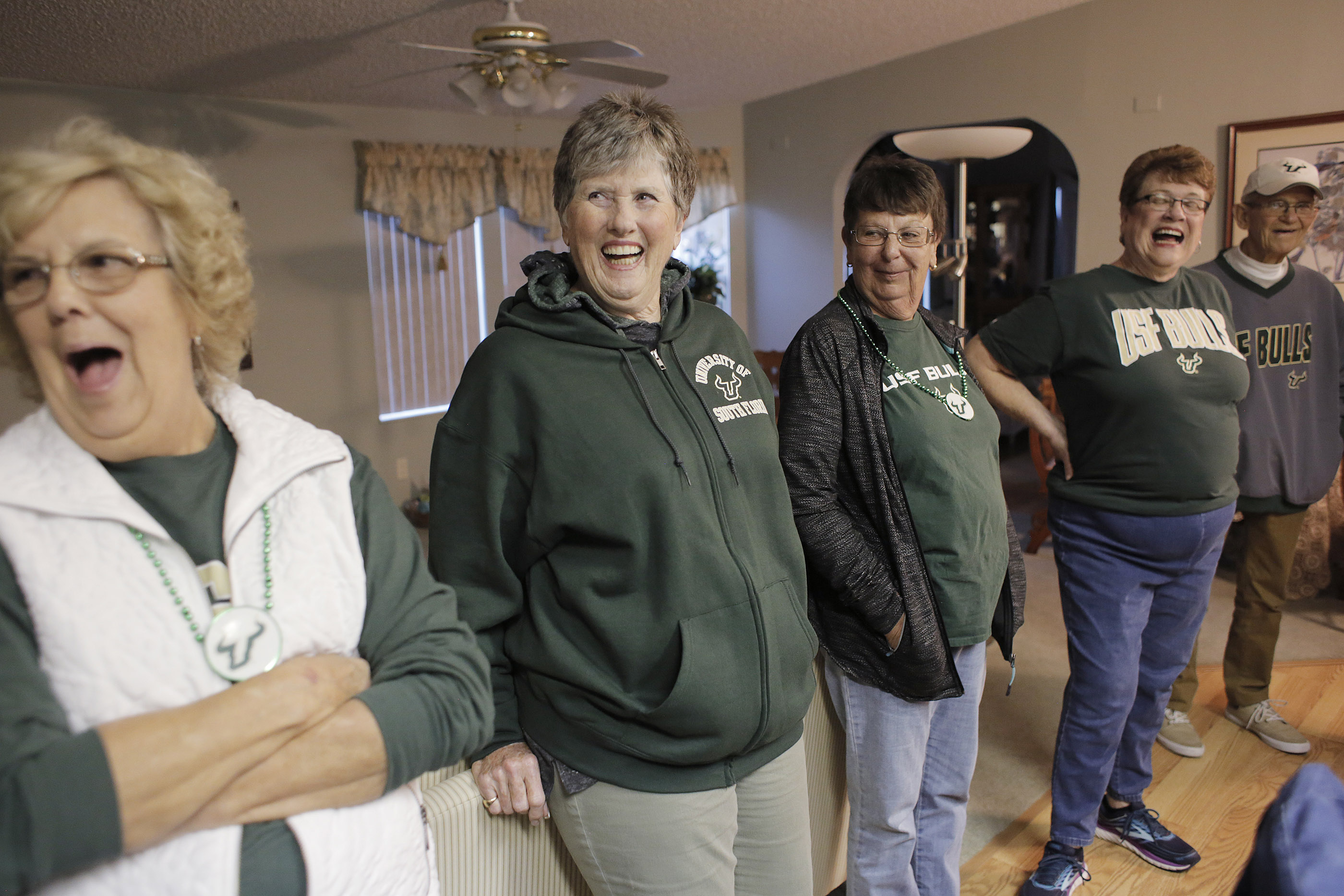 (From left) Terri Bosley, Linda Parkhurst, Carol Kelly and Asa McClellan meet up in Zephyrhills before carpooling to the Yuengling Center in Tampa for a USF women's game. (OCTAVIO JONES | Times) (From left) Terri Bosley, Linda Parkhurst, Carol Kelly and Asa McClellan meet up in Zephyrhills before carpooling to the Yuengling Center in Tampa for a USF women's game. (OCTAVIO JONES | Times)