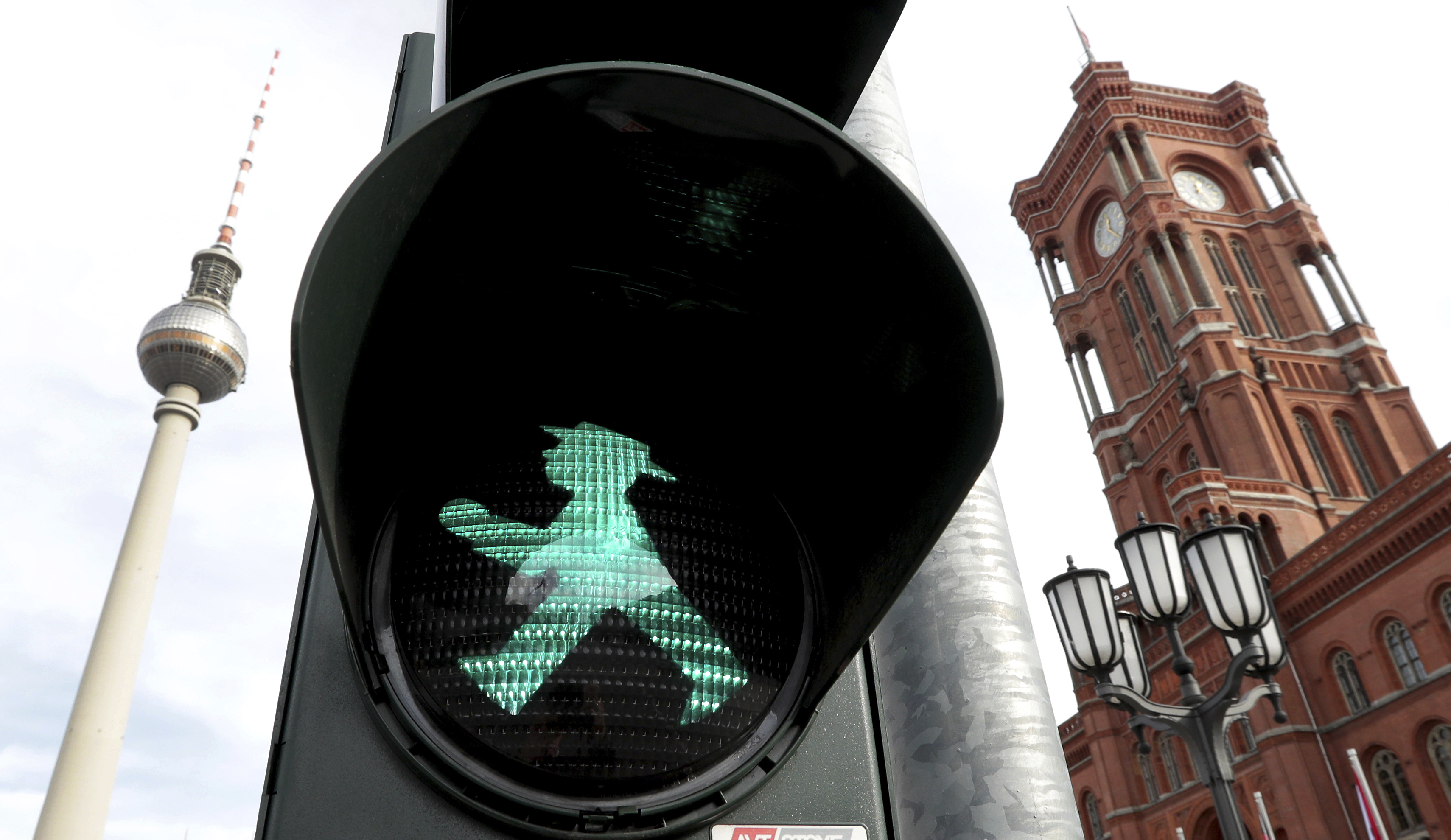 The Ampelmaennchen — literally the “little traffic light man” — signals that it's safe to cross a Berlin street. It is a holdover from East Berlin. Michael Sohn | AP The Ampelmaennchen — literally the “little traffic light man” — signals that it's safe to cross a Berlin street. It is a holdover from East Berlin. Michael Sohn | AP