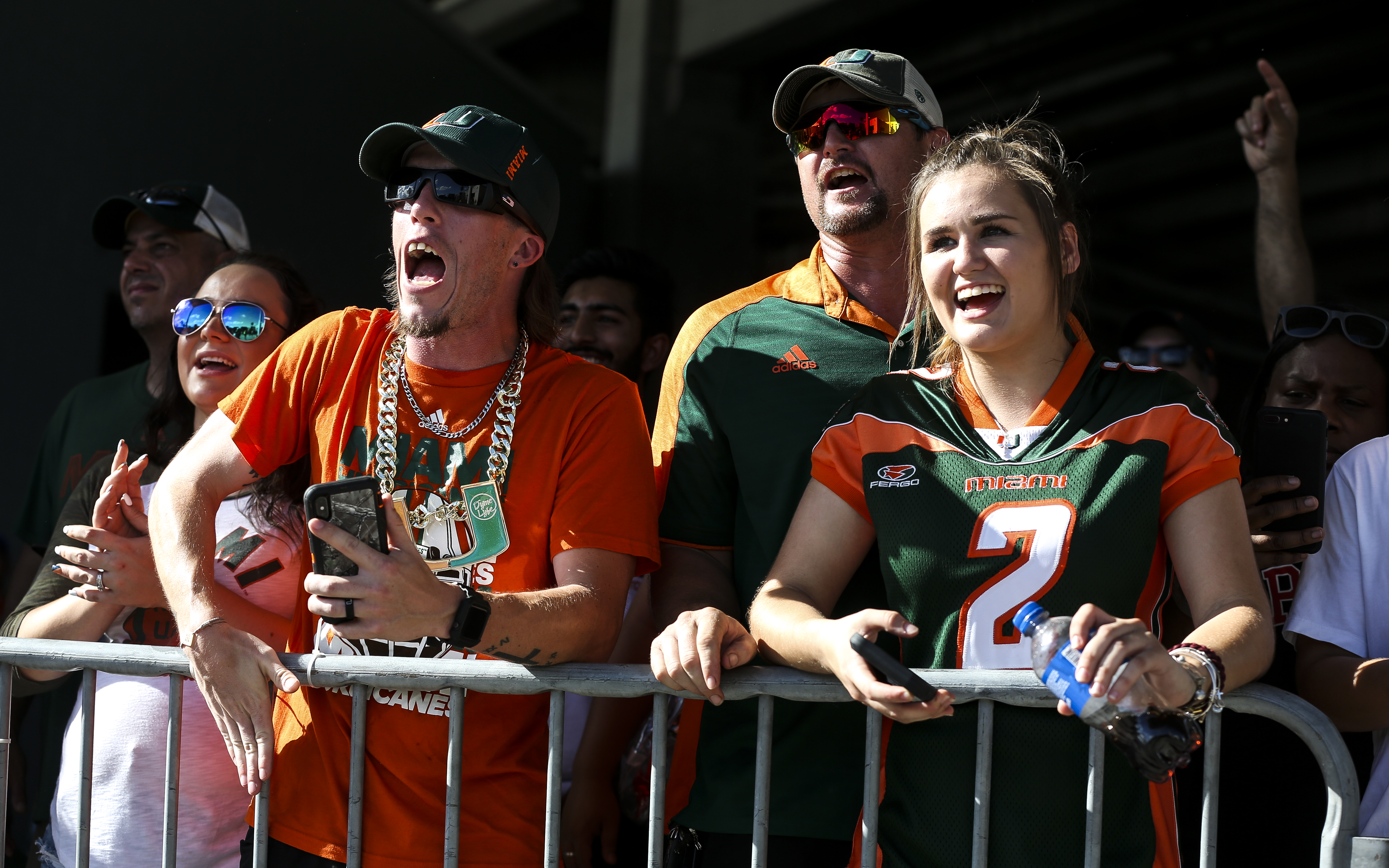 Miami Hurricanes fans cheer for players as they arrive before the game at Camping World Stadium. MONICA HERNDON | Tampa Bay Times Miami Hurricanes fans cheer for players as they arrive before the game at Camping World Stadium. MONICA HERNDON | Tampa Bay Times