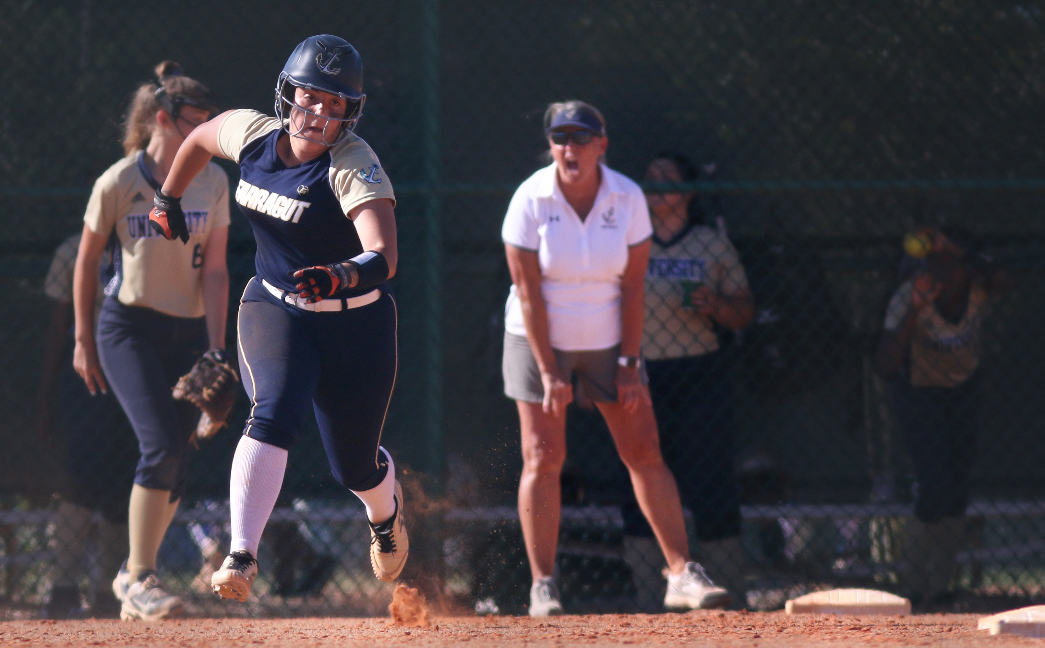 Admiral Farragut senior Katya Fe takes off from first base after a hit by Alyssa Rano. (SCOTT PURKS | Special to the Times) Admiral Farragut senior Katya Fe takes off from first base after a hit by Alyssa Rano. (SCOTT PURKS | Special to the Times)