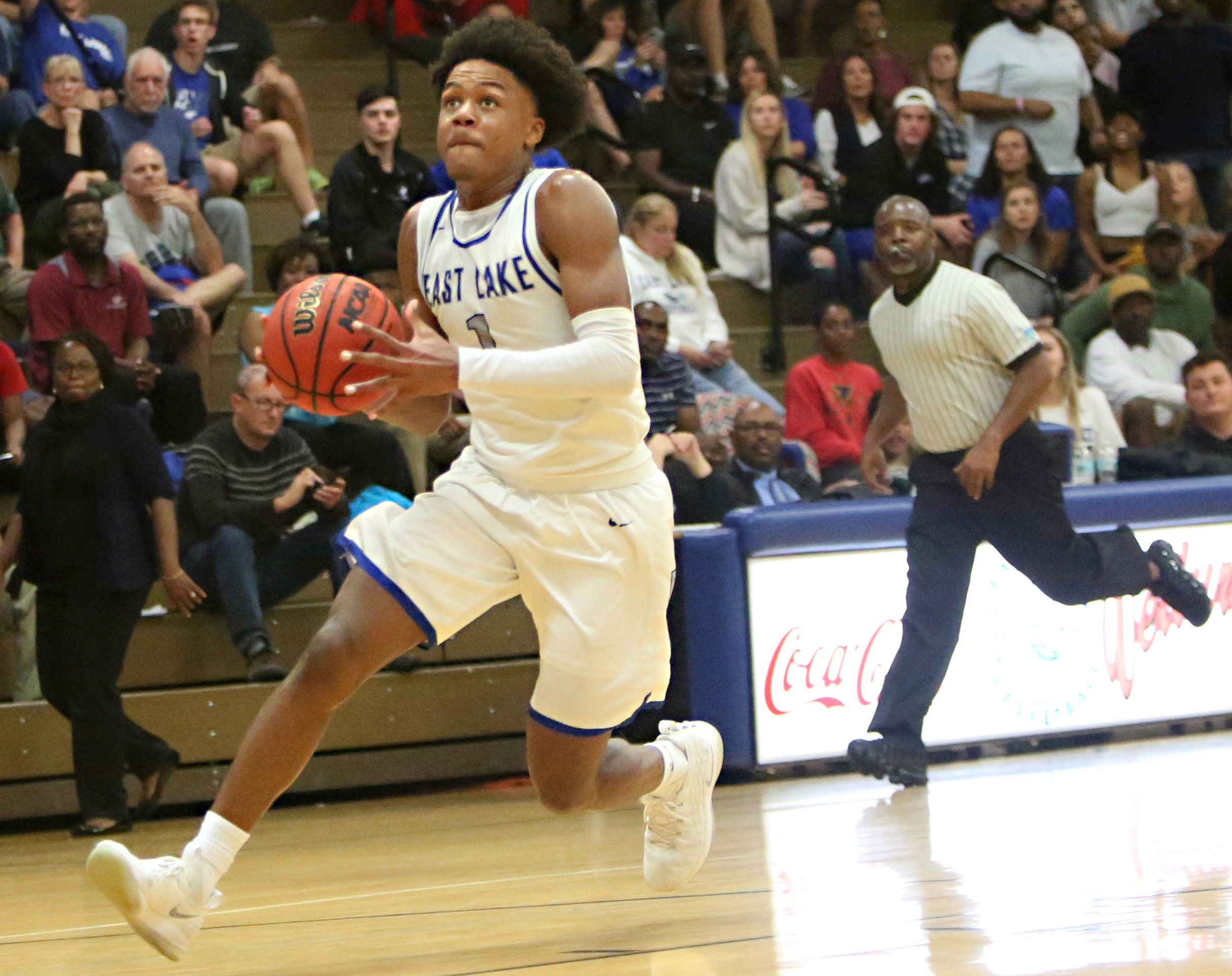 East Lake guard Dionte Blanch drives to the hoop during furious action against a December game against St. Petersburg. (SCOTT PURKS | Special to the Times) East Lake guard Dionte Blanch drives to the hoop during furious action against a December game against St. Petersburg. (SCOTT PURKS | Special to the Times)