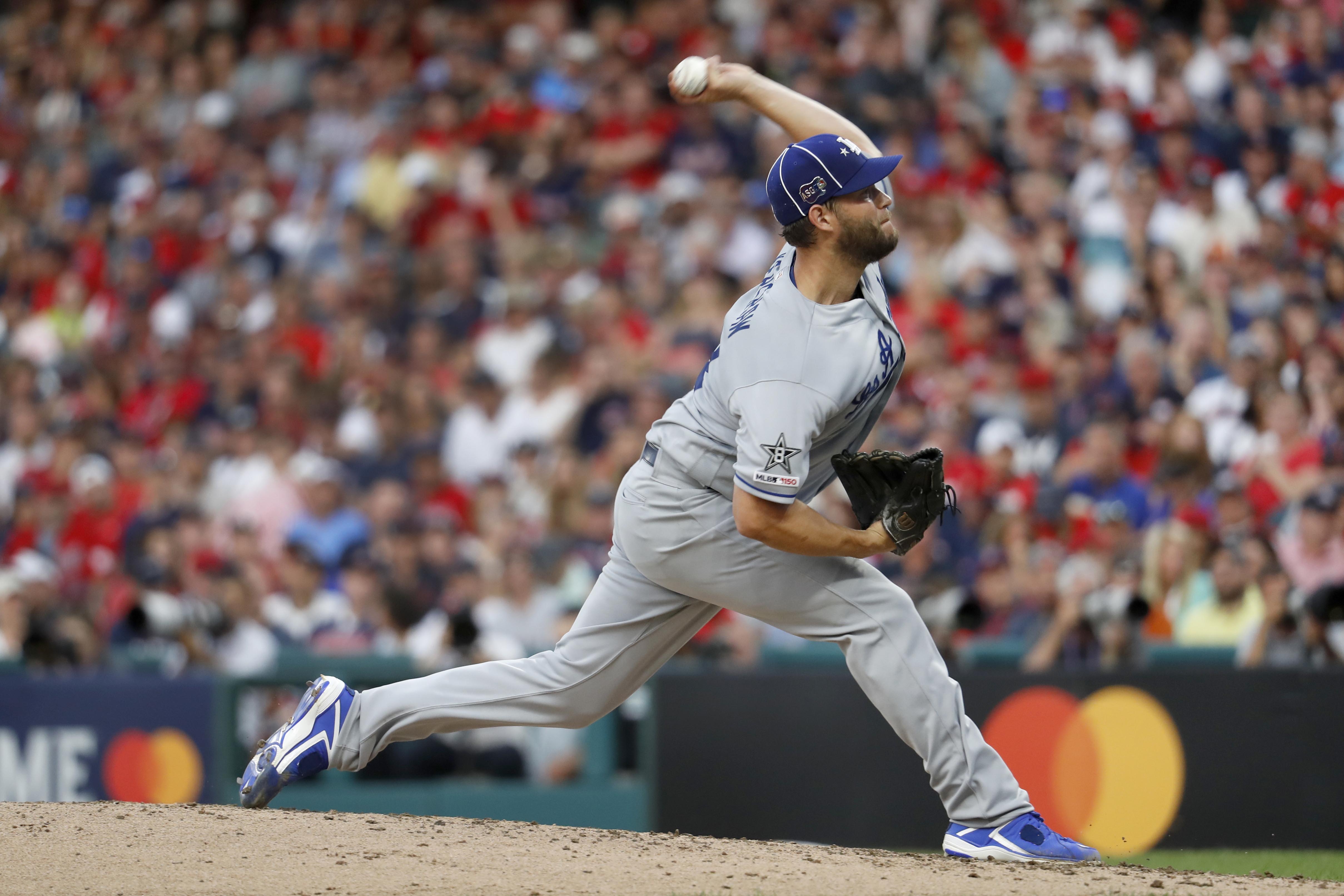 National League pitcher Clayton Kershaw, of the Los Angeles Dodgers, throws during the second inning of the MLB baseball All-Star Game against the American League, Tuesday, July 9, 2019, in Cleveland. (AP Photo/John Minchillo) National League pitcher Clayton Kershaw, of the Los Angeles Dodgers, throws during the second inning of the MLB baseball All-Star Game against the American League, Tuesday, July 9, 2019, in Cleveland. (AP Photo/John Minchillo)