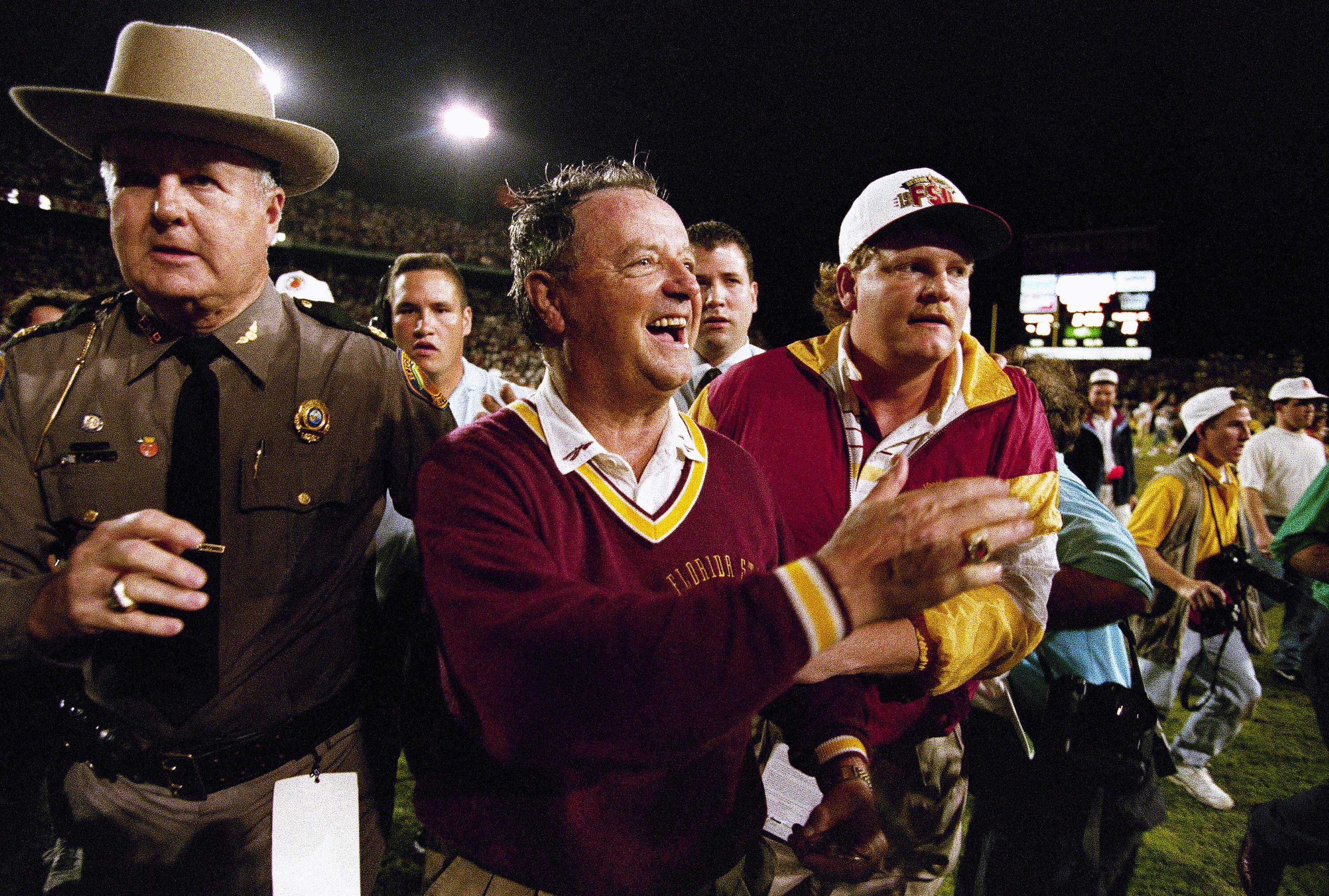 In this Jan. 1, 1994, file photo, Florida State coach Bobby Bowden celebrates after defeating Nebraska 18-16 in the Orange Bowl. (AP Photo/Doug Mills, File) In this Jan. 1, 1994, file photo, Florida State coach Bobby Bowden celebrates after defeating Nebraska 18-16 in the Orange Bowl. (AP Photo/Doug Mills, File)