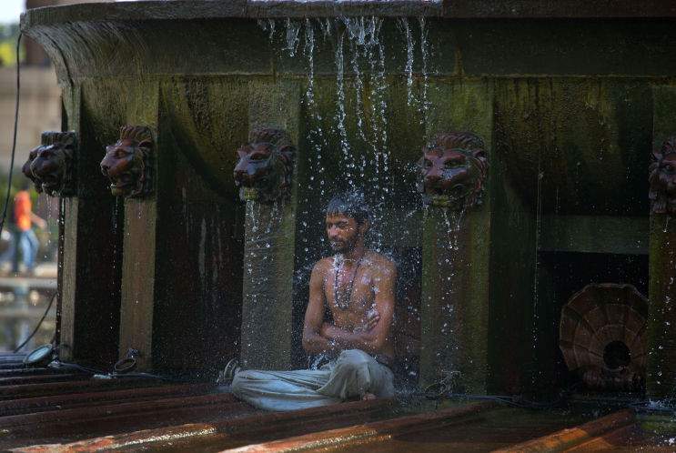 A man cools himself under a public fountain in New Delhi, India. A new study suggests parts of India, Pakistan and Bangladesh may become so hot and humid by the end of the century it will be deadly to be outdoors. That would threaten millions of people. A man cools himself under a public fountain in New Delhi, India. A new study suggests parts of India, Pakistan and Bangladesh may become so hot and humid by the end of the century it will be deadly to be outdoors. That would threaten millions of people.