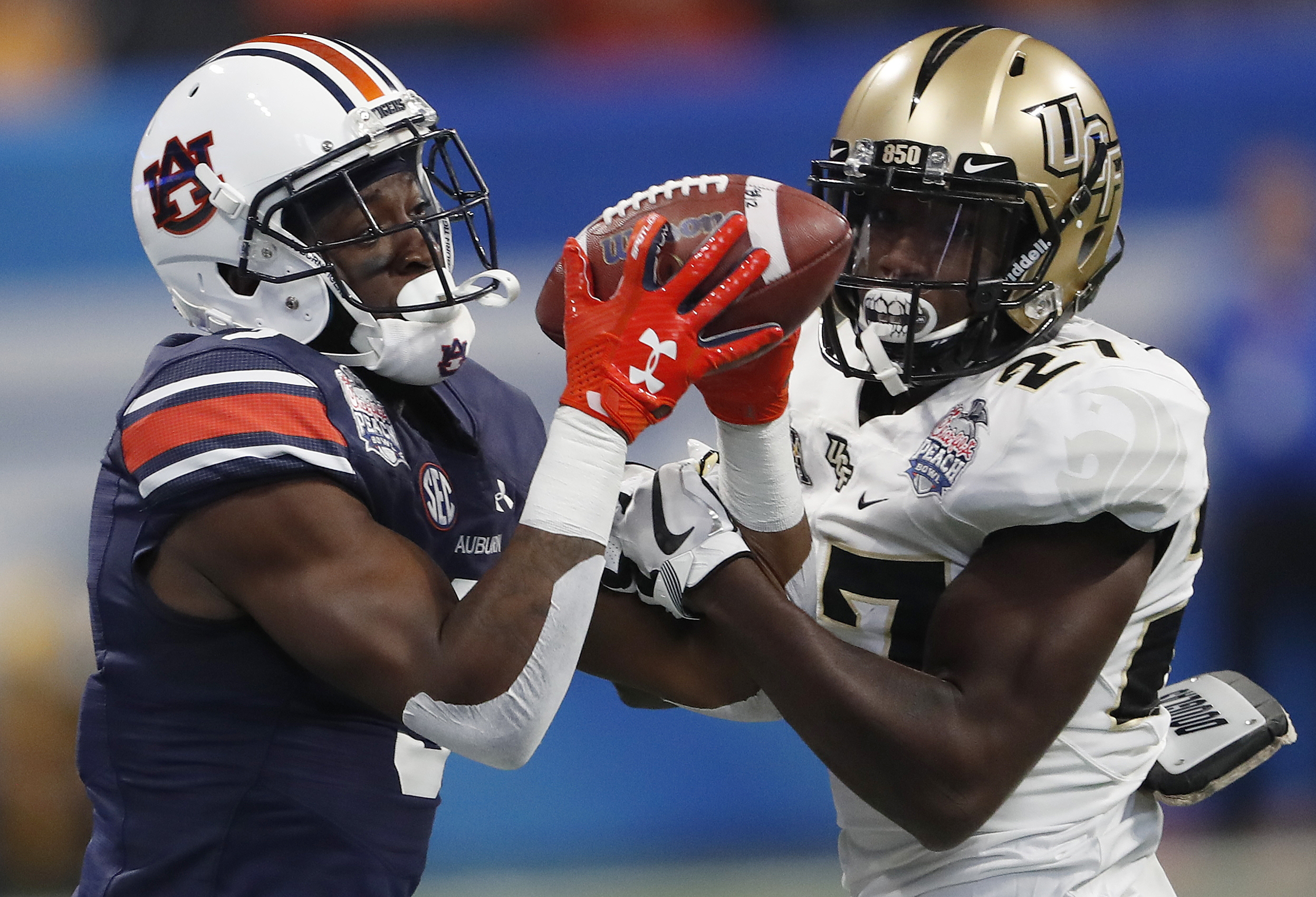 Auburn wide receiver Nate Craig-Myers (3) makes the catch ahead of Central Florida defensive back Richie Grant (27) during the first half of the Peach Bowl NCAA college football game, Monday, Jan. 1, 2018, in Atlanta. (AP Photo/John Bazemore) Auburn wide receiver Nate Craig-Myers (3) makes the catch ahead of Central Florida defensive back Richie Grant (27) during the first half of the Peach Bowl NCAA college football game, Monday, Jan. 1, 2018, in Atlanta. (AP Photo/John Bazemore)