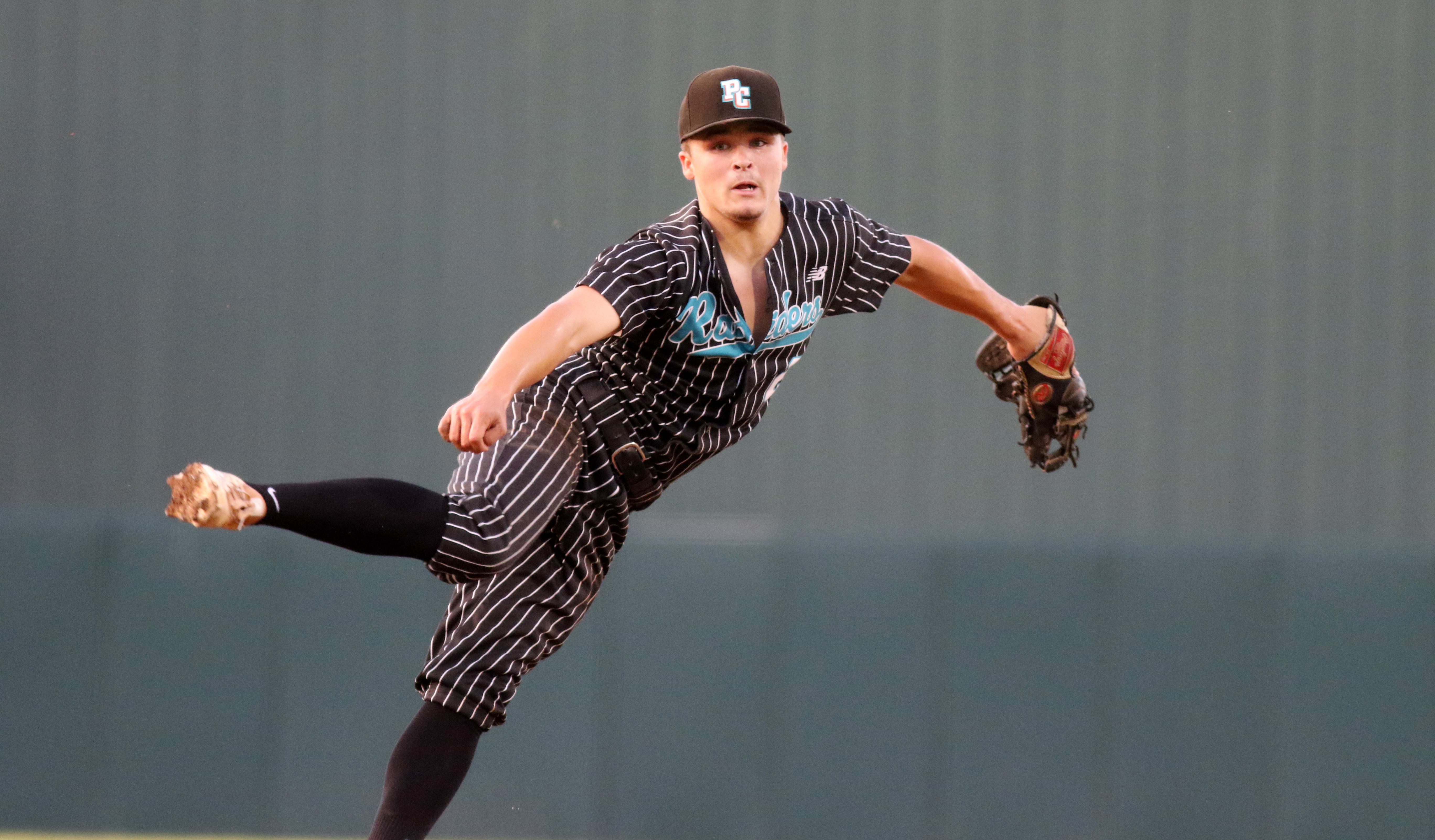 Plant City starter Jarod Wingo fires a pitch Thursday night during the Class 8A state final against Strawberry Crest. (SCOTT PURKS | Special to the Times) Plant City starter Jarod Wingo fires a pitch Thursday night during the Class 8A state final against Strawberry Crest. (SCOTT PURKS | Special to the Times)