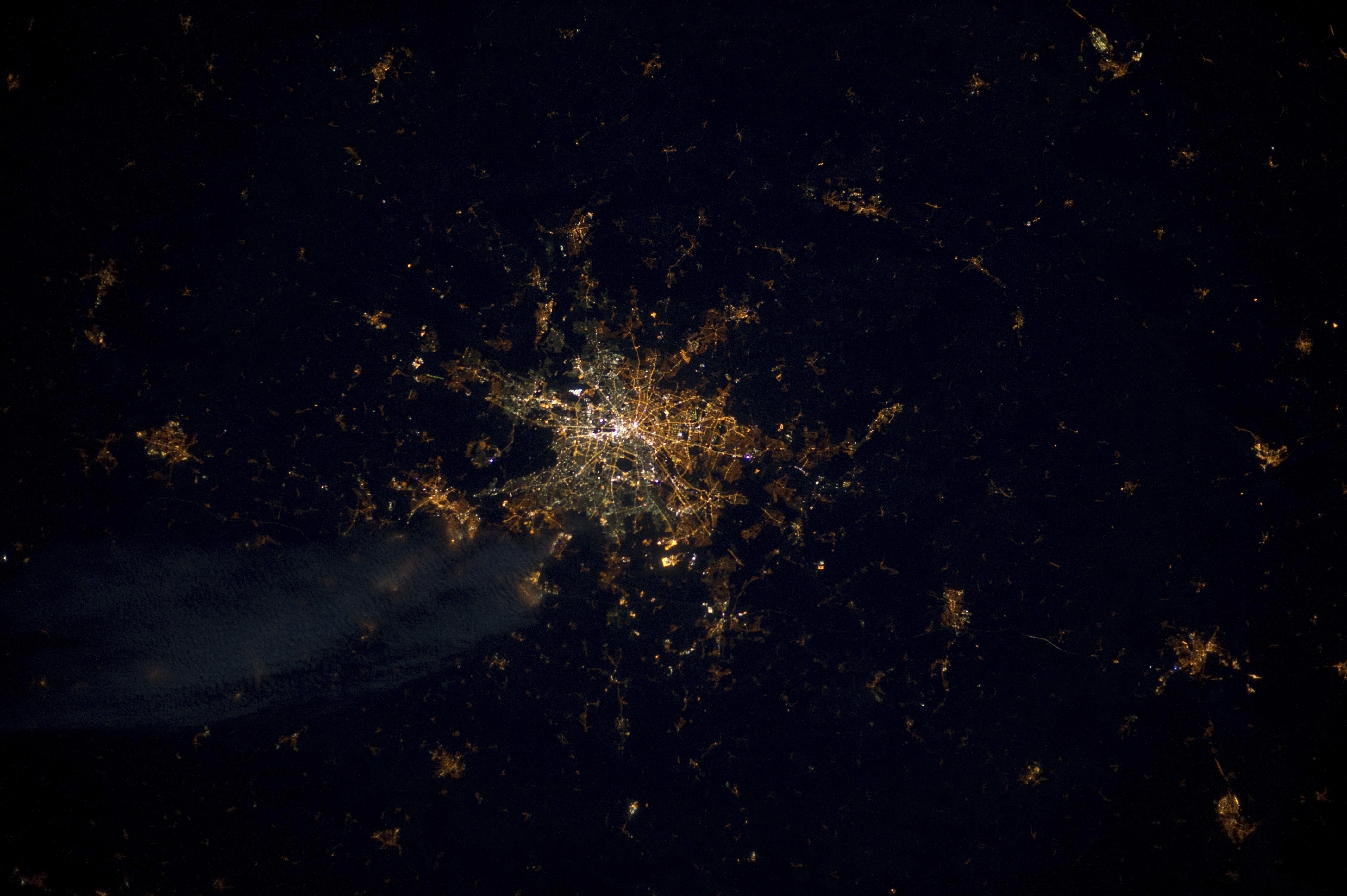 A photo provided by the European Space Agency and captured by ESA astronaut Andre Kuipers, shows the German capital Berlin from the International Space Station. Seen from above, streetlights in the former East Berlin appear slightly more orange; those in the western part of the city are a harsher yellow. AP A photo provided by the European Space Agency and captured by ESA astronaut Andre Kuipers, shows the German capital Berlin from the International Space Station. Seen from above, streetlights in the former East Berlin appear slightly more orange; those in the western part of the city are a harsher yellow. AP