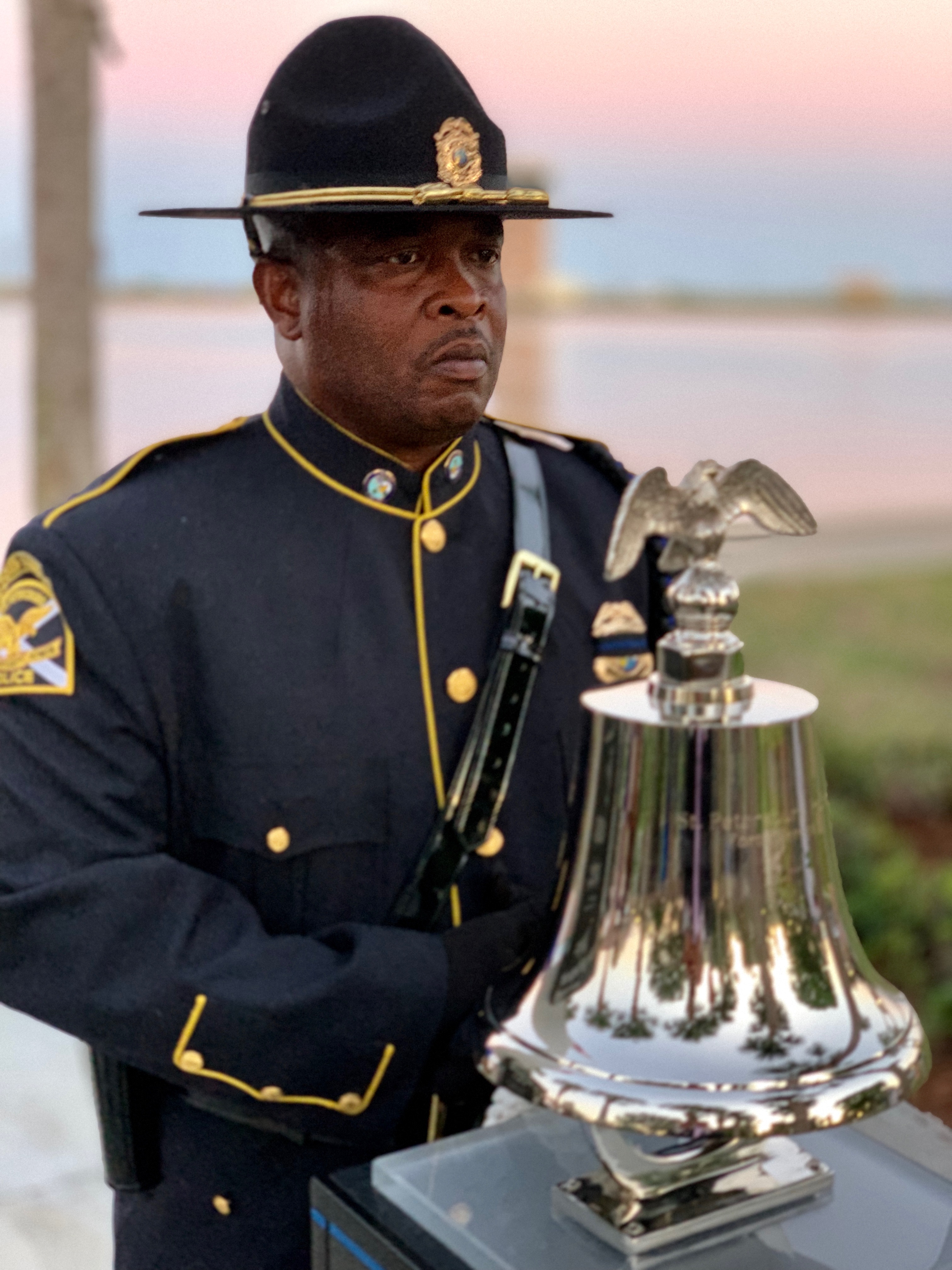 Sgt. Marlin Heyward right rang the bell 15 times representing the distinguished service of each officer. Sgt. Marlin Heyward right rang the bell 15 times representing the distinguished service of each officer.