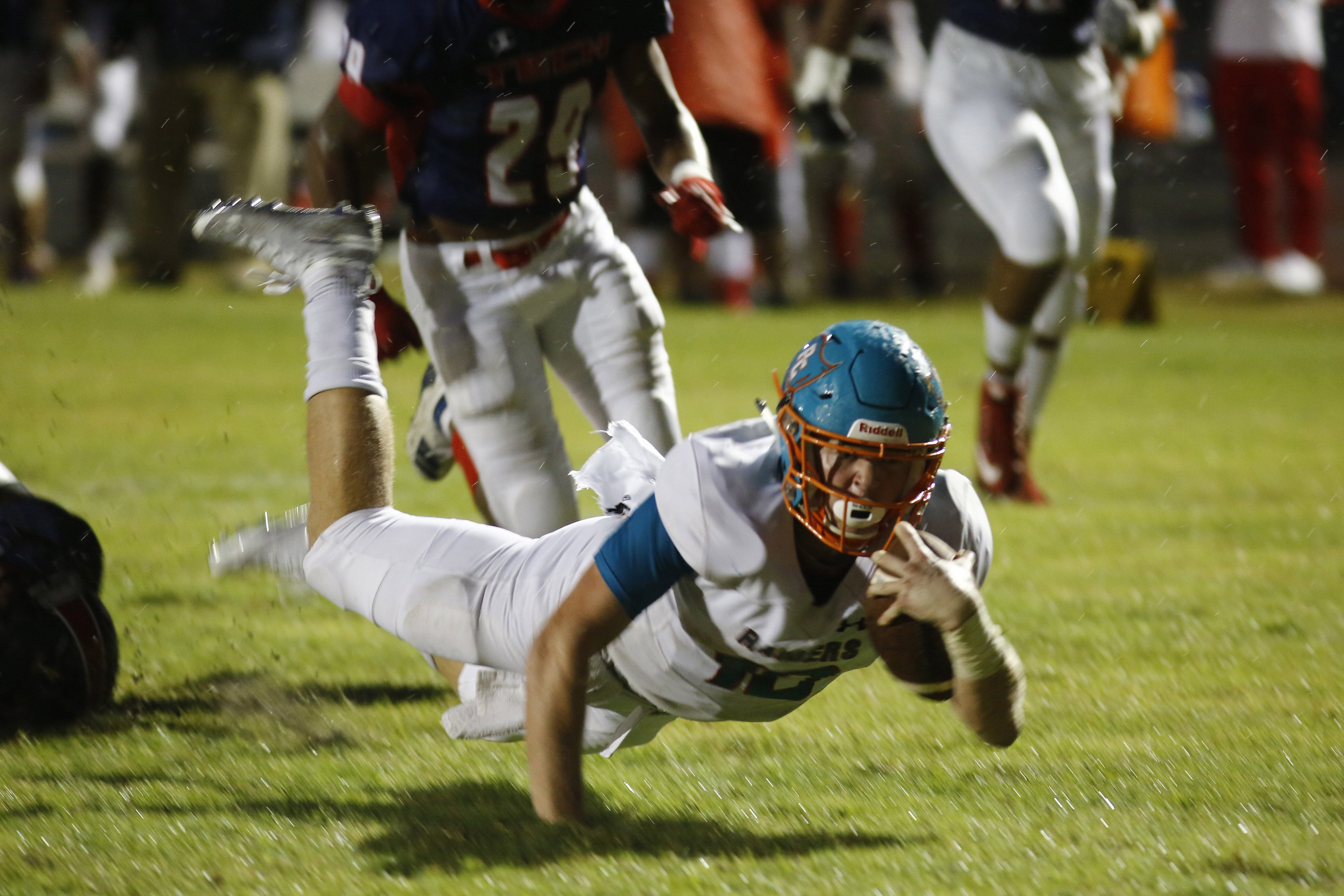 Plant City quarterback Makenzie Kennedy dives for extra yardage in an Aug. 30 game against Tampa Bay Tech. LUIS SANTANA | Times Plant City quarterback Makenzie Kennedy dives for extra yardage in an Aug. 30 game against Tampa Bay Tech. LUIS SANTANA | Times