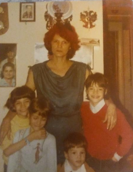 James Hanson, Jr., front, is seen in a family photo with his now-late mother Pamela Ann Hanson and his three sisters. Sister Cynthia McLemore, front left, let her younger brother move in with her last month after he was released from prison. He kept this photo in his cell. James Hanson, Jr., front, is seen in a family photo with his now-late mother Pamela Ann Hanson and his three sisters. Sister Cynthia McLemore, front left, let her younger brother move in with her last month after he was released from prison. He kept this photo in his cell.