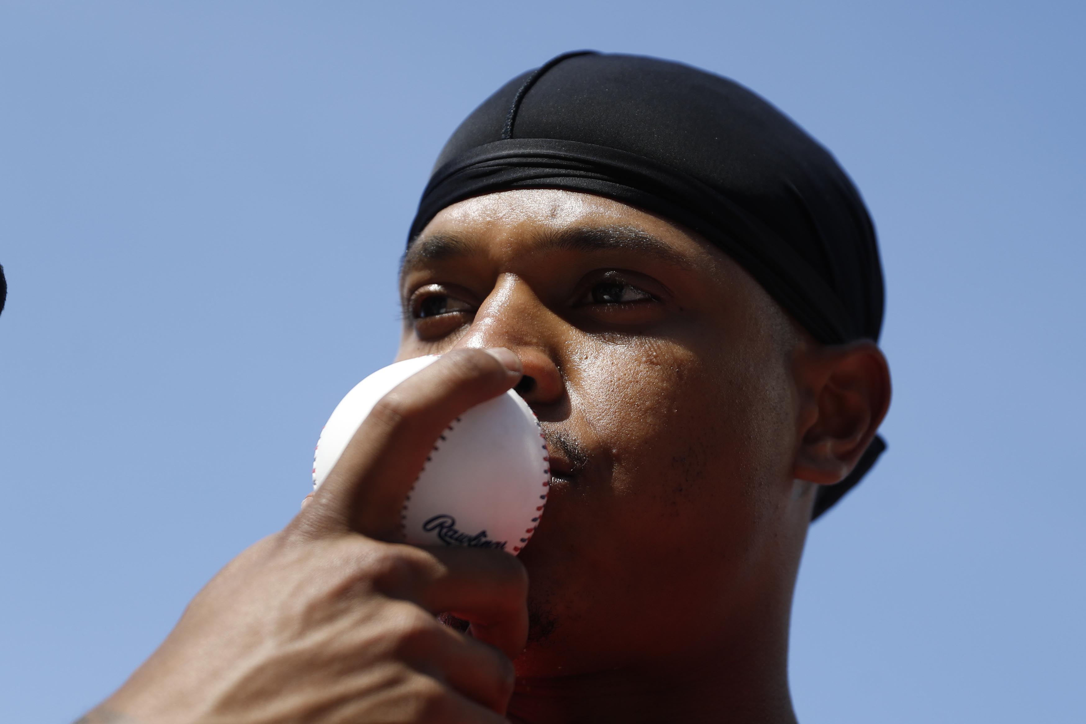 Marcus Stroman, of the Toronto Blue Jays, holds a baseball as the American League players take batting practice before the MLB baseball All-Star Game, Tuesday, July 9, 2019, in Cleveland. (AP Photo/John Minchillo) Marcus Stroman, of the Toronto Blue Jays, holds a baseball as the American League players take batting practice before the MLB baseball All-Star Game, Tuesday, July 9, 2019, in Cleveland. (AP Photo/John Minchillo)
