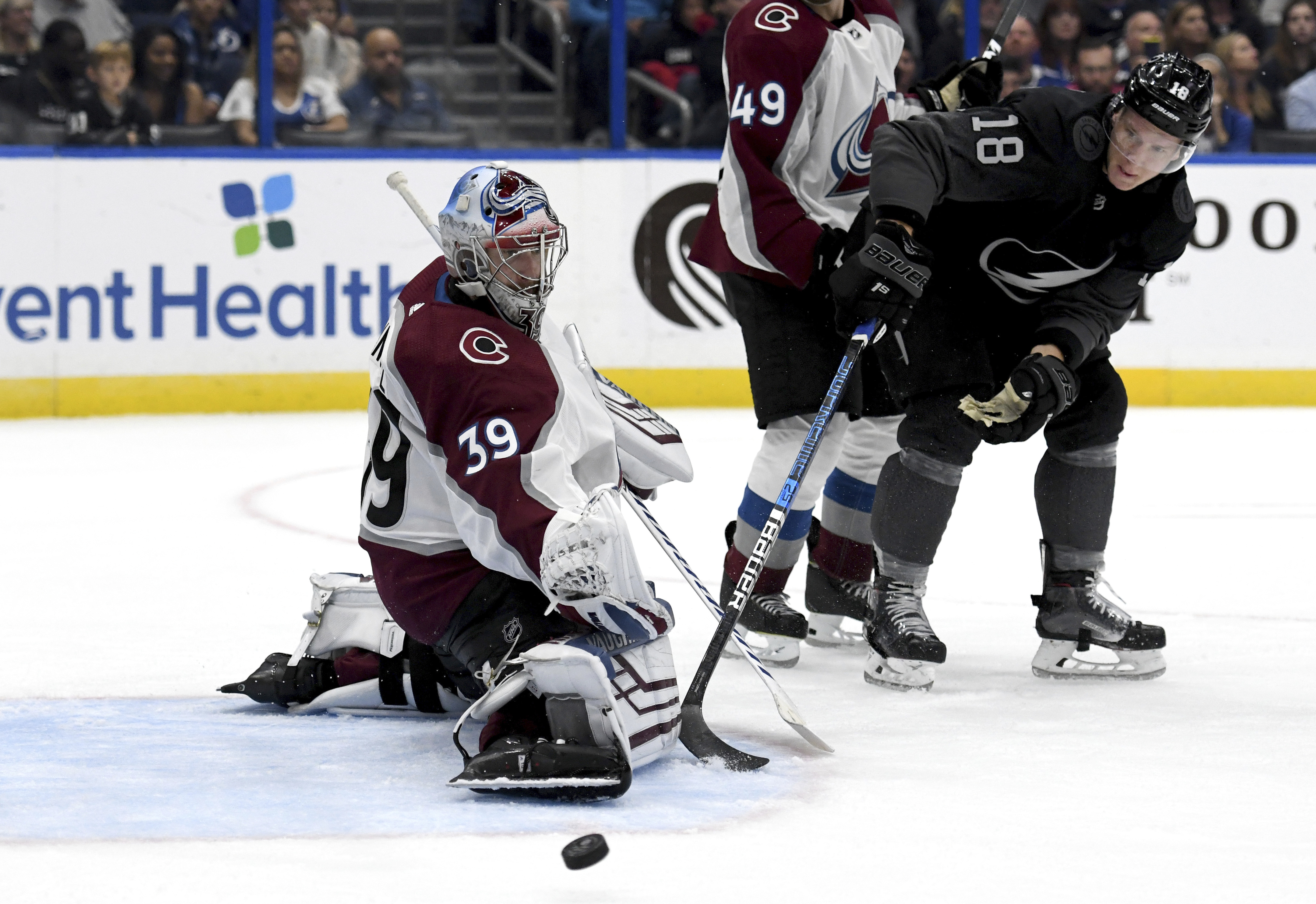 Colorado Avalanche goaltender Pavel Francouz (39) stops a shot from Tampa Bay Lightning left wing Ondrej Palat (18) during the second period of an NHL hockey game Saturday, Oct. 19, 2019, in Tampa, Fla. (AP Photo/Jason Behnken) Jason Behnken | AP Colorado Avalanche goaltender Pavel Francouz (39) stops a shot from Tampa Bay Lightning left wing Ondrej Palat (18) during the second period of an NHL hockey game Saturday, Oct. 19, 2019, in Tampa, Fla. (AP Photo/Jason Behnken) Jason Behnken | AP
