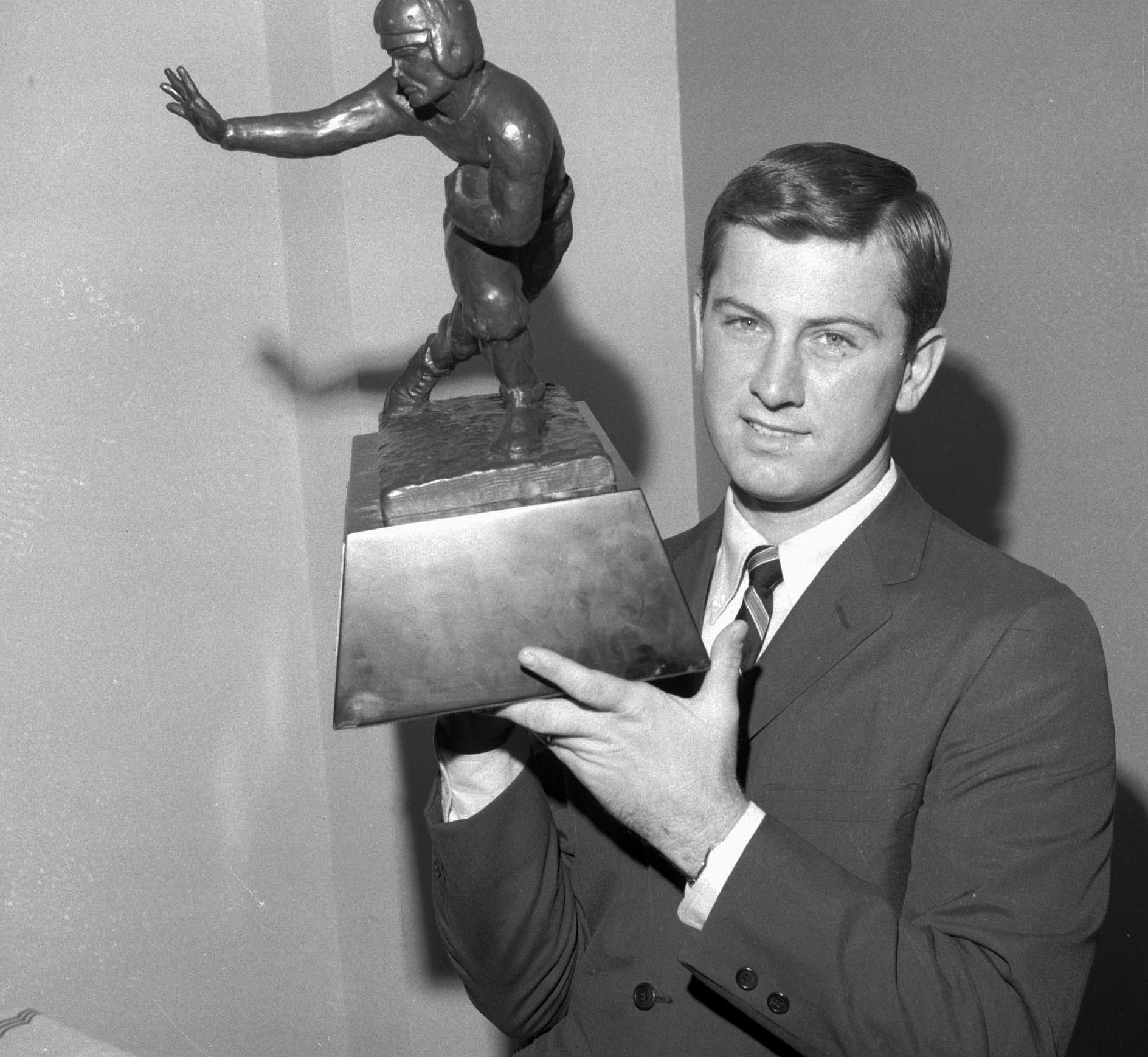 Steve Spurrier, the University of Florida quarterback, holds the Heisman Trophy. (Associated Press, 1966) Steve Spurrier, the University of Florida quarterback, holds the Heisman Trophy. (Associated Press, 1966)