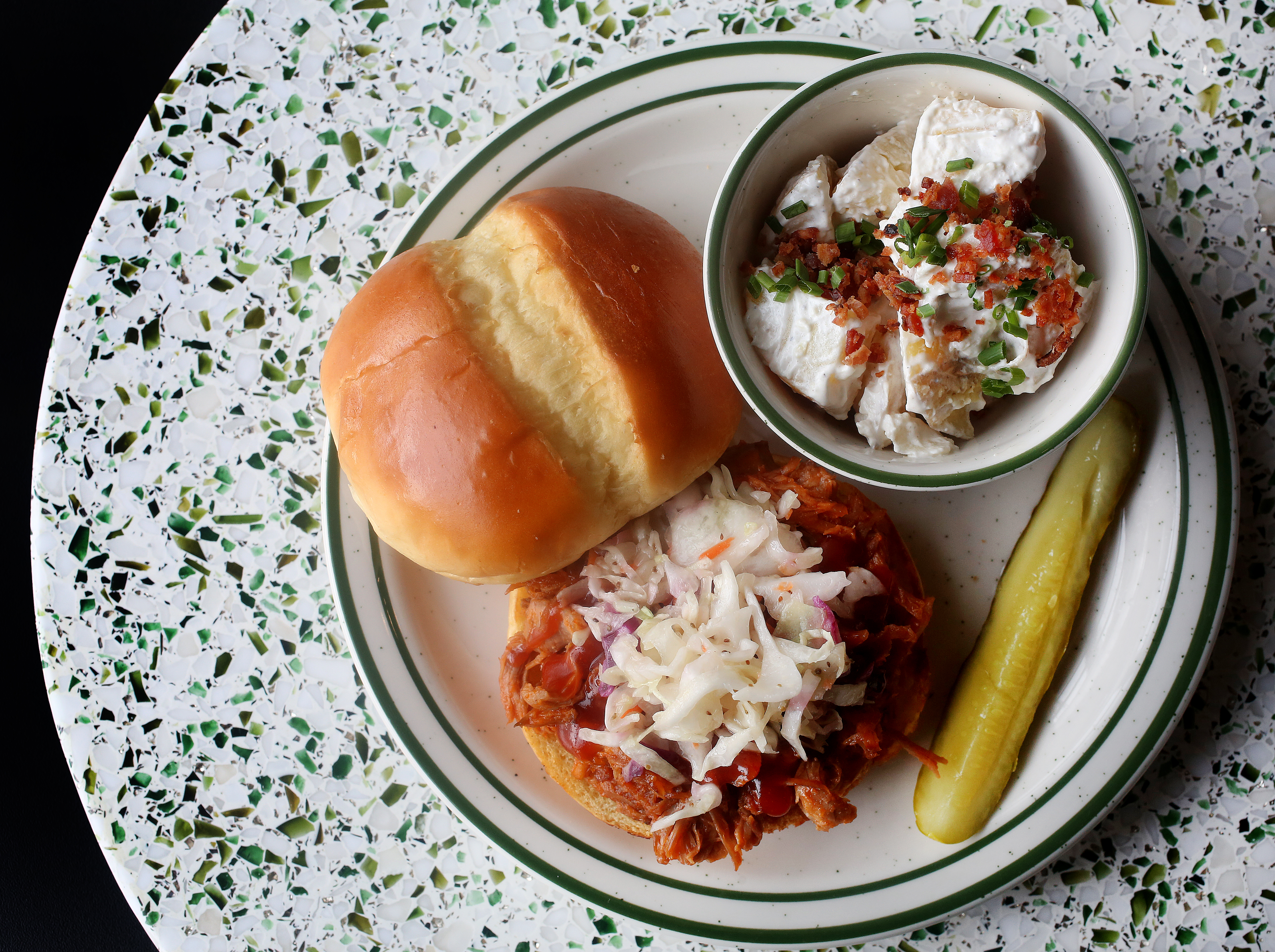 Another food item is the barbecue pork sandwich, served on a potato roll with homemade sauce. Horseradish potato salad on the side. SCOTT KEELER | Times | Tampa Bay Times Another food item is the barbecue pork sandwich, served on a potato roll with homemade sauce. Horseradish potato salad on the side. SCOTT KEELER | Times | Tampa Bay Times