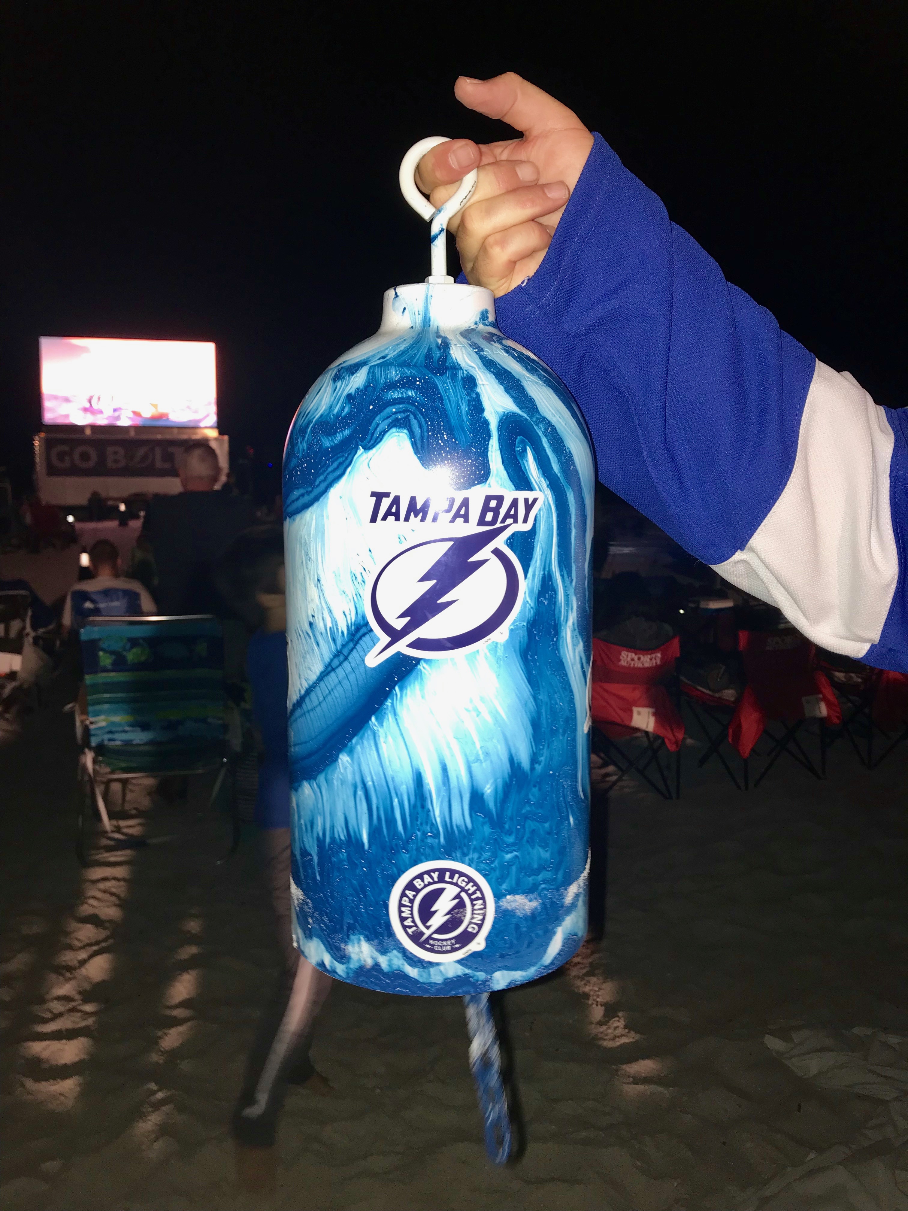 Rickey Barber, of St. Petersburg, holds up a Lightning-themed bell his son gifted him last year. He used it for the first time at the Lightning vs. Rangers watch party on Feb. 2. Rickey Barber, of St. Petersburg, holds up a Lightning-themed bell his son gifted him last year. He used it for the first time at the Lightning vs. Rangers watch party on Feb. 2.