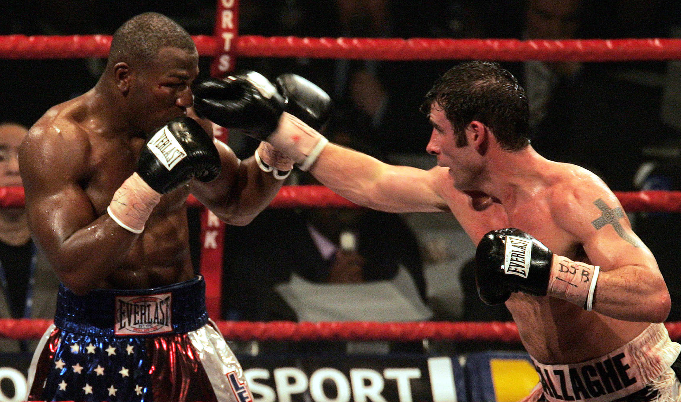 Super middleweight boxer Joe Calzaghe, right, the WBO champion, fights against Jeff Lacy, the IBF champion, during their unification fight in Manchester. (PAUL ELLIS/AFP/Getty Images) Super middleweight boxer Joe Calzaghe, right, the WBO champion, fights against Jeff Lacy, the IBF champion, during their unification fight in Manchester. (PAUL ELLIS/AFP/Getty Images)