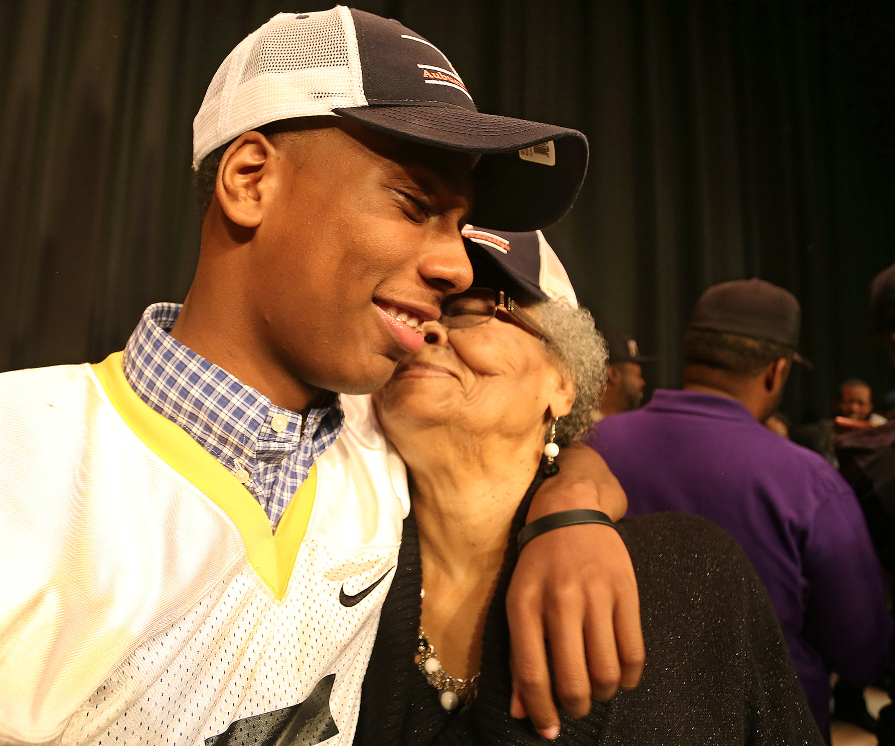 Ryan Davis gets a hug from his grandmother, Emma Davis, on national signing day in 2015. Davis announced that he would attend Auburn University. (SCOTT KEELER | Times) Ryan Davis gets a hug from his grandmother, Emma Davis, on national signing day in 2015. Davis announced that he would attend Auburn University. (SCOTT KEELER | Times)