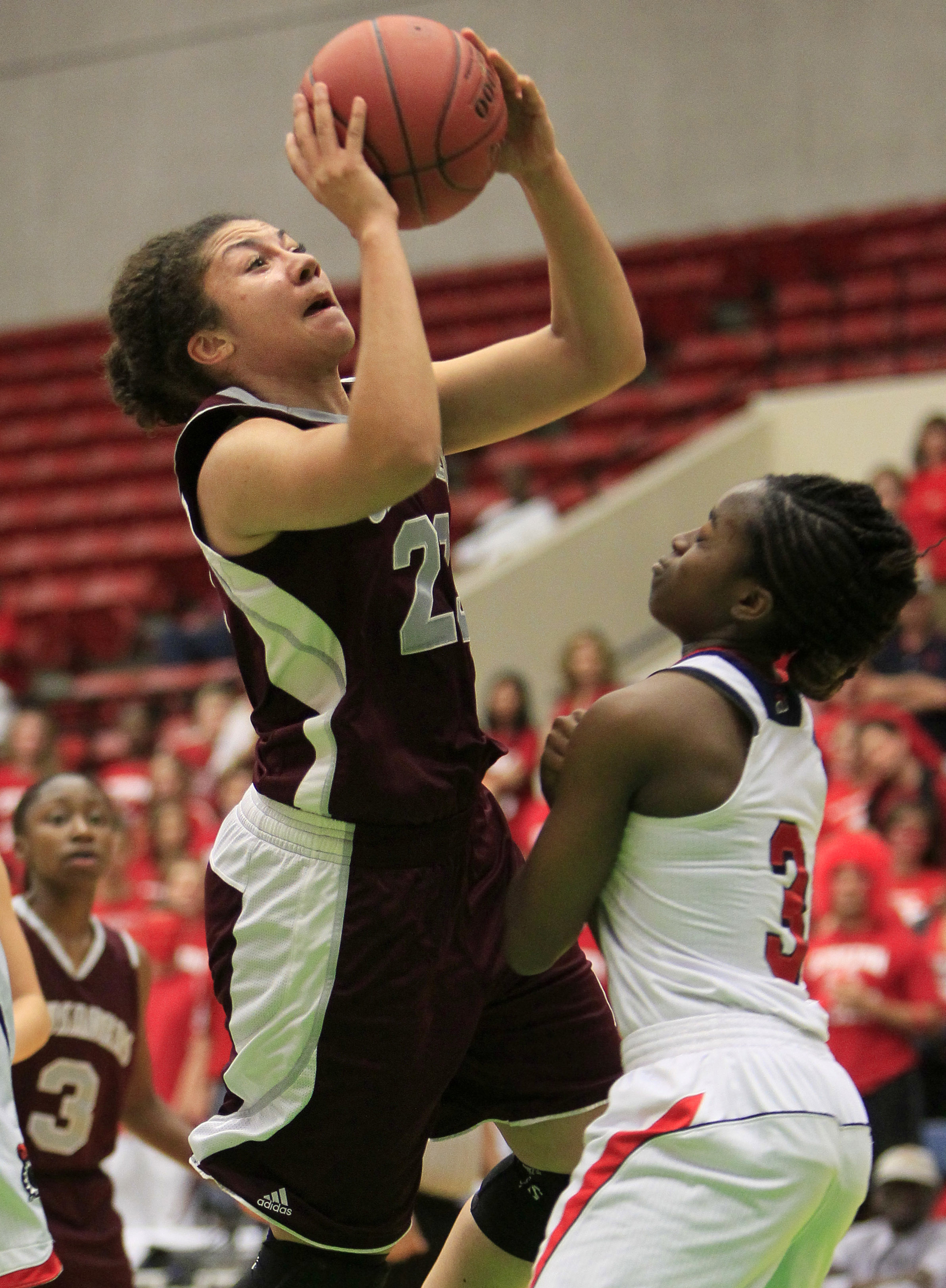 Seffner Christian's Peyton Walker goes up for a shot against Miami Country Day's Channise Lewis during the 2014 state semifinals. (DIRK SHADD | Times) Seffner Christian's Peyton Walker goes up for a shot against Miami Country Day's Channise Lewis during the 2014 state semifinals. (DIRK SHADD | Times)