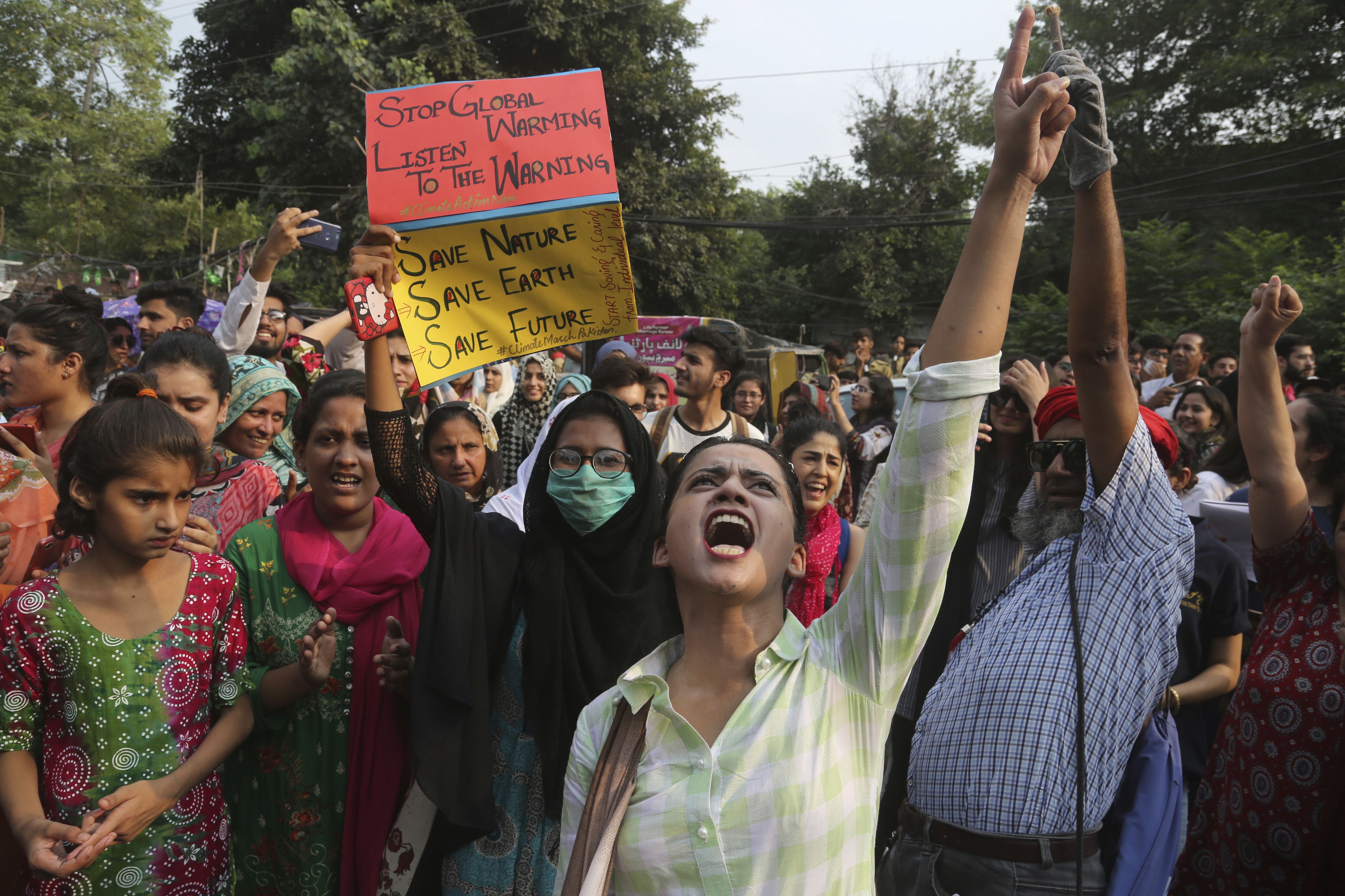 FILE - In this Friday, Sept. 20, 2019 file photo, students take part in a climate march in Lahore, Pakistan, part of a wave of protests around the world. Many young climate activists say they feel hopeless and overwhelmed _ and psychologists say that’s OK and it’s good they’re talking about it. It’s sometimes called climate change anxiety and you don’t have to be an activist or young to feel it. K.M. Chaudary | AP FILE - In this Friday, Sept. 20, 2019 file photo, students take part in a climate march in Lahore, Pakistan, part of a wave of protests around the world. Many young climate activists say they feel hopeless and overwhelmed _ and psychologists say that’s OK and it’s good they’re talking about it. It’s sometimes called climate change anxiety and you don’t have to be an activist or young to feel it. K.M. Chaudary | AP