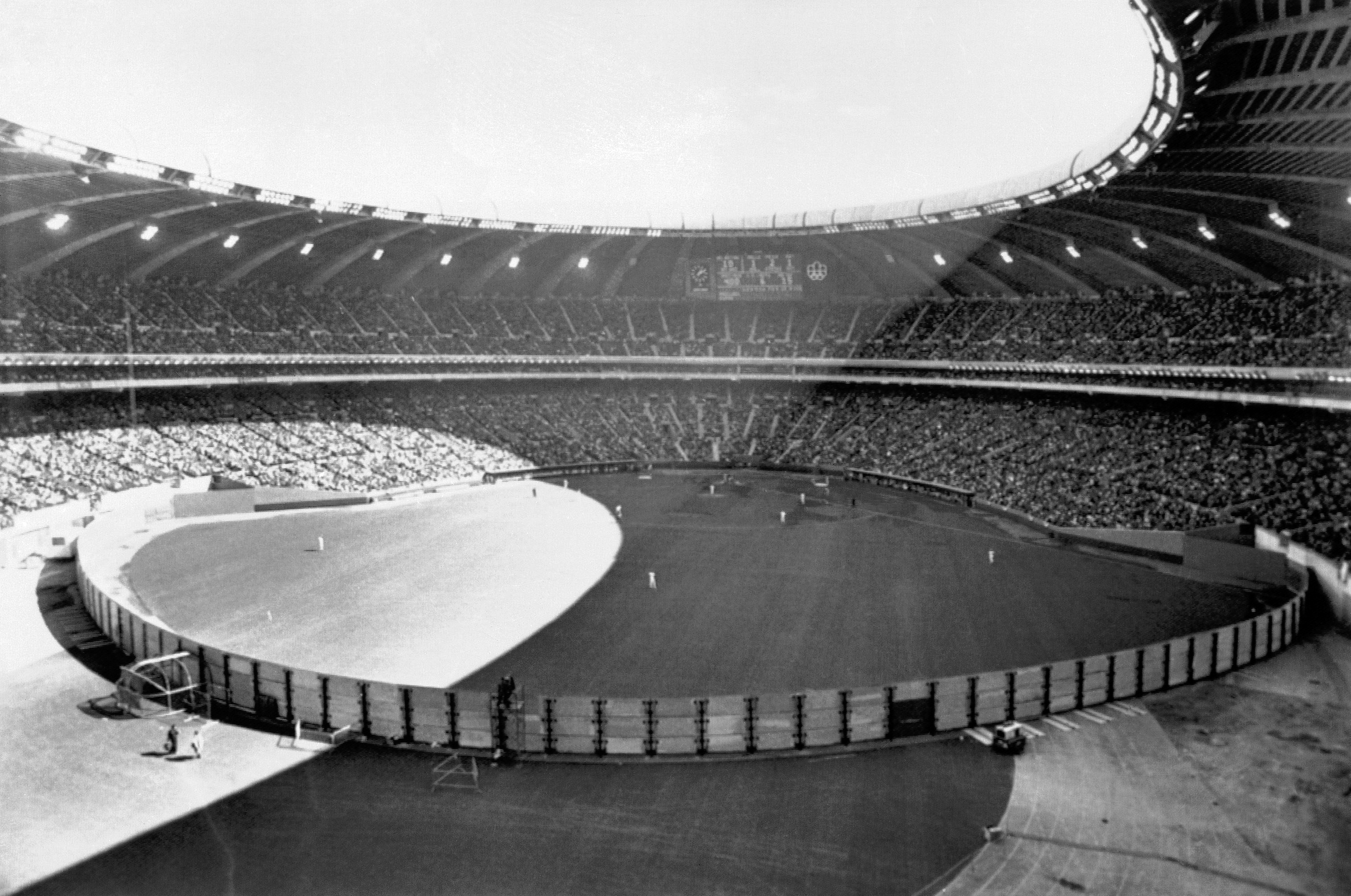 This file photo shows the view from behind the center field fence as more than 57,000 fans jammed into Olympic Stadium for the Montreal Expos home opener against Philadelphia Phillies in Montreal, April 16, 1977. (AP Photo/DMB) This file photo shows the view from behind the center field fence as more than 57,000 fans jammed into Olympic Stadium for the Montreal Expos home opener against Philadelphia Phillies in Montreal, April 16, 1977. (AP Photo/DMB)