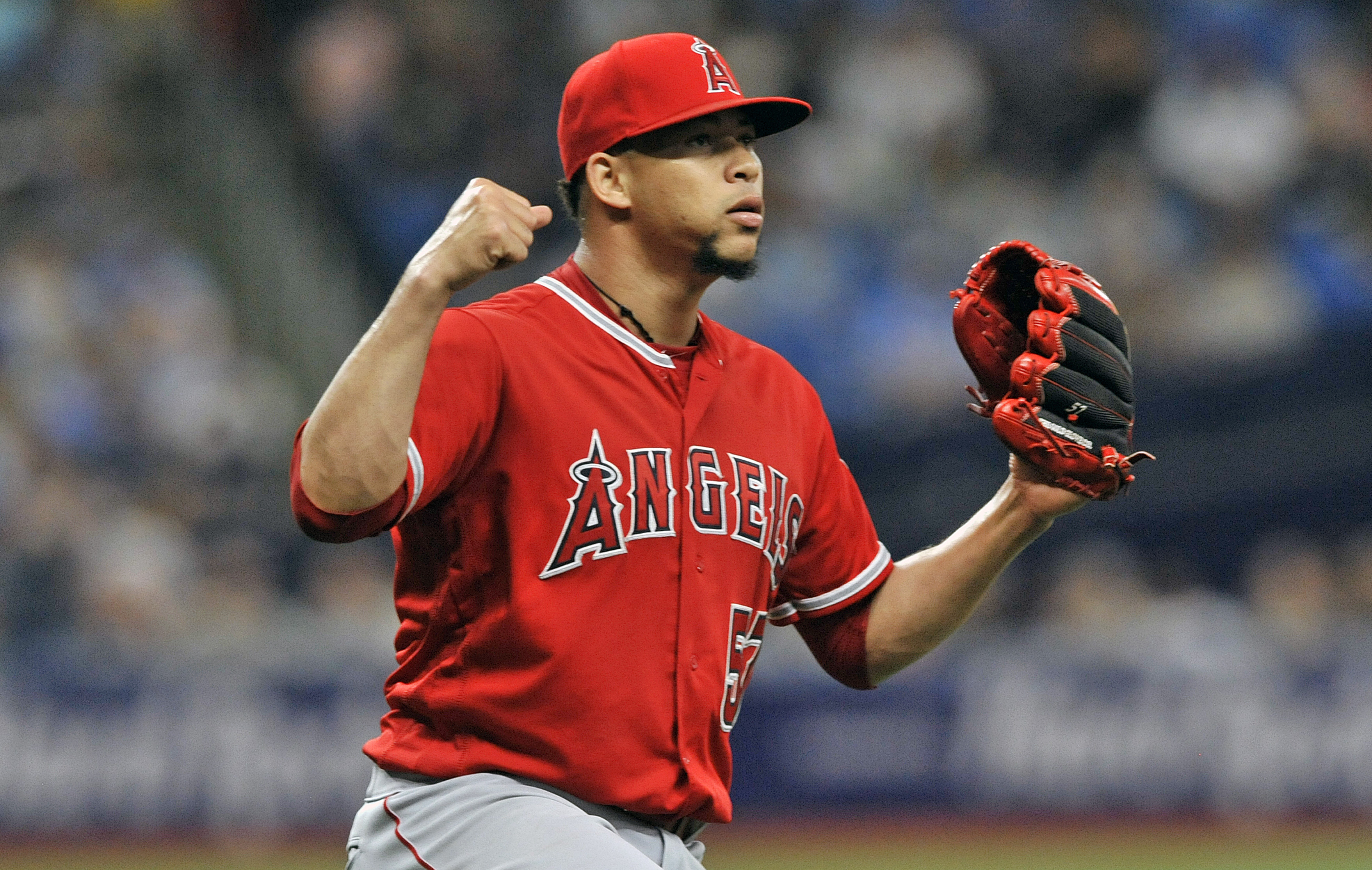 Los Angeles Angels closer Hansel Robles celebrates the final out of a 5-3 win over the Tampa Bay Rays during the ninth inning of a baseball game Saturday, June 15, 2019, in St. Petersburg, Fla. (AP Photo/Steve Nesius) Los Angeles Angels closer Hansel Robles celebrates the final out of a 5-3 win over the Tampa Bay Rays during the ninth inning of a baseball game Saturday, June 15, 2019, in St. Petersburg, Fla. (AP Photo/Steve Nesius)