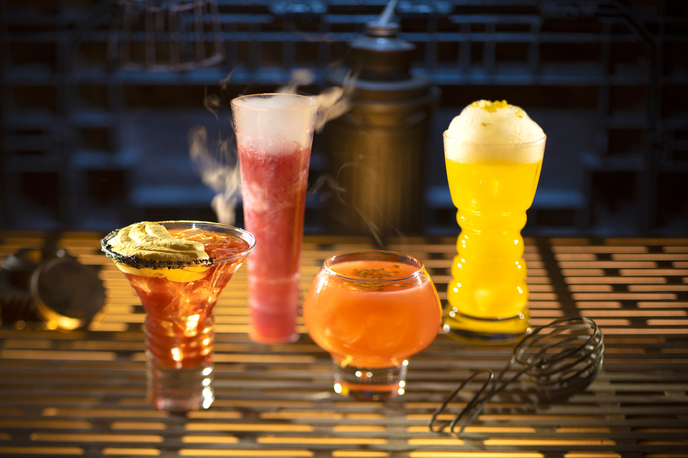 Alcoholic beverages that can be found in Oga's Cantina, from left to right, are the Outer Rim, Bespin Fizz, Yub Nub, and Fuzzy Tauntaun. They cost $15-$18 inside Star Wars: Galaxy's Edge. Kent Phillips | Walt Disney World Alcoholic beverages that can be found in Oga's Cantina, from left to right, are the Outer Rim, Bespin Fizz, Yub Nub, and Fuzzy Tauntaun. They cost $15-$18 inside Star Wars: Galaxy's Edge. Kent Phillips | Walt Disney World