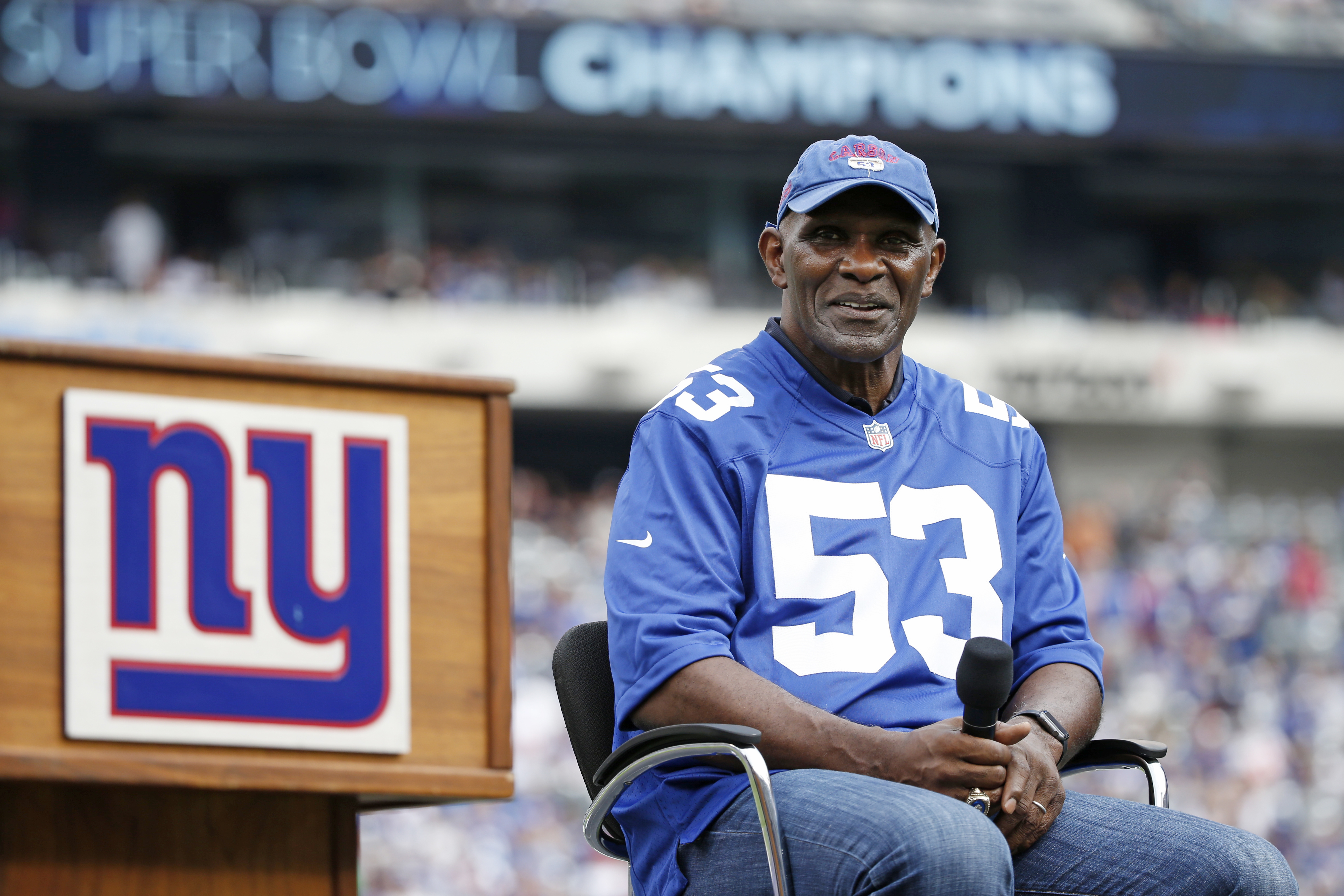 Former New York Giants player Harry Carson listens during a halftime ceremony of an NFL football game between the New York Giants and the New Orleans Saints on Sept. 18, 2016. Kathy Willens | AP Former New York Giants player Harry Carson listens during a halftime ceremony of an NFL football game between the New York Giants and the New Orleans Saints on Sept. 18, 2016. Kathy Willens | AP