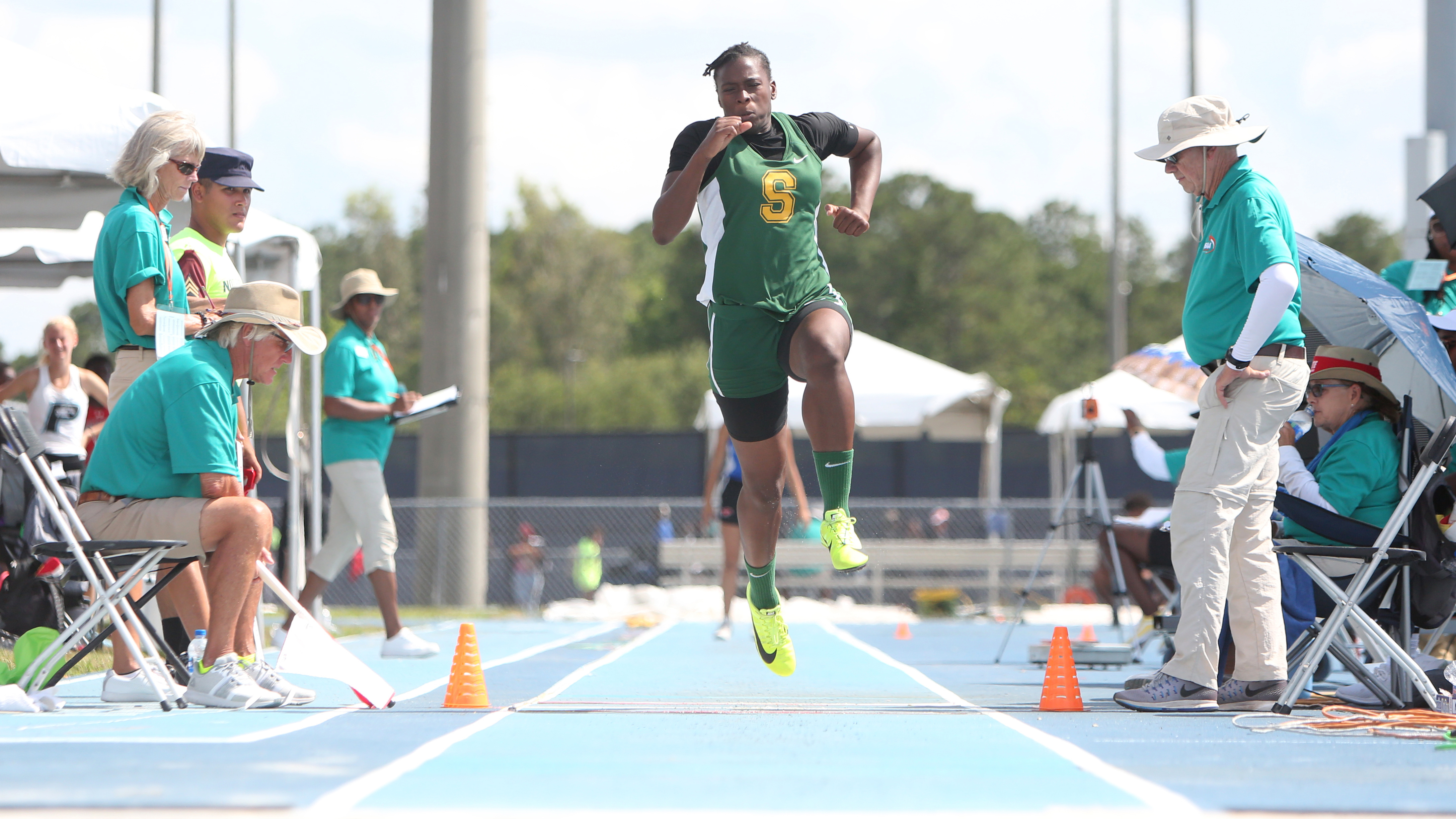 Shorecrest senior Renice Dacres charges toward victory in the Class A state final triple jump, winning with a leap 11.65 meters, or 38-2.75 feet. (SCOTT PURKS | Special to the Times) Shorecrest senior Renice Dacres charges toward victory in the Class A state final triple jump, winning with a leap 11.65 meters, or 38-2.75 feet. (SCOTT PURKS | Special to the Times)