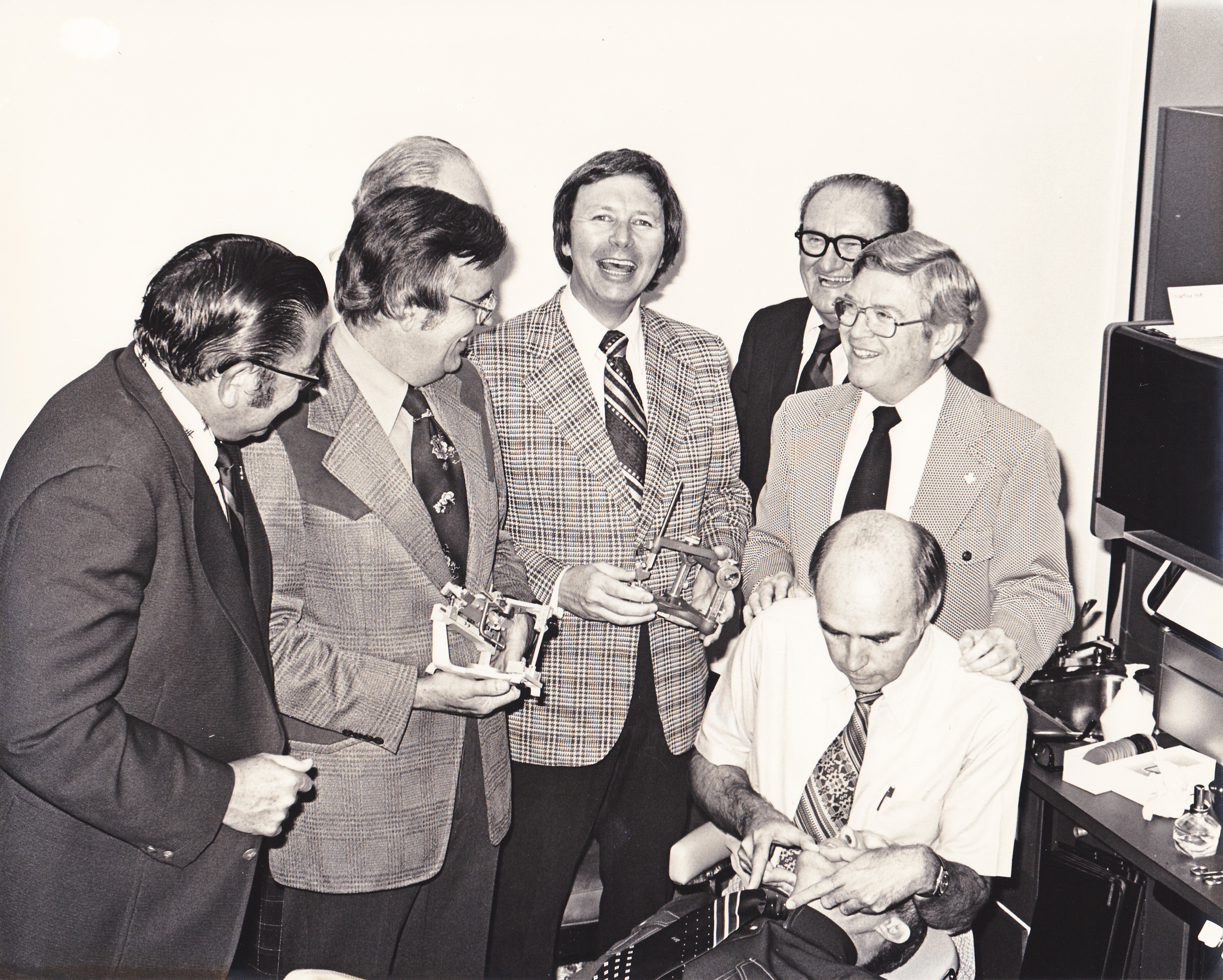 Dr. Peter Dawson, seated, with a group of prominent dentists who got together to debate differing viewpoints in denistry. His teaching extended to his church, where he taught Sunday School and Bible study. He also helped develop dental ministries through the Christian Medical and Dental Associations. (Photo courtesy Anne Dawson) Dr. Peter Dawson, seated, with a group of prominent dentists who got together to debate differing viewpoints in denistry. His teaching extended to his church, where he taught Sunday School and Bible study. He also helped develop dental ministries through the Christian Medical and Dental Associations. (Photo courtesy Anne Dawson)