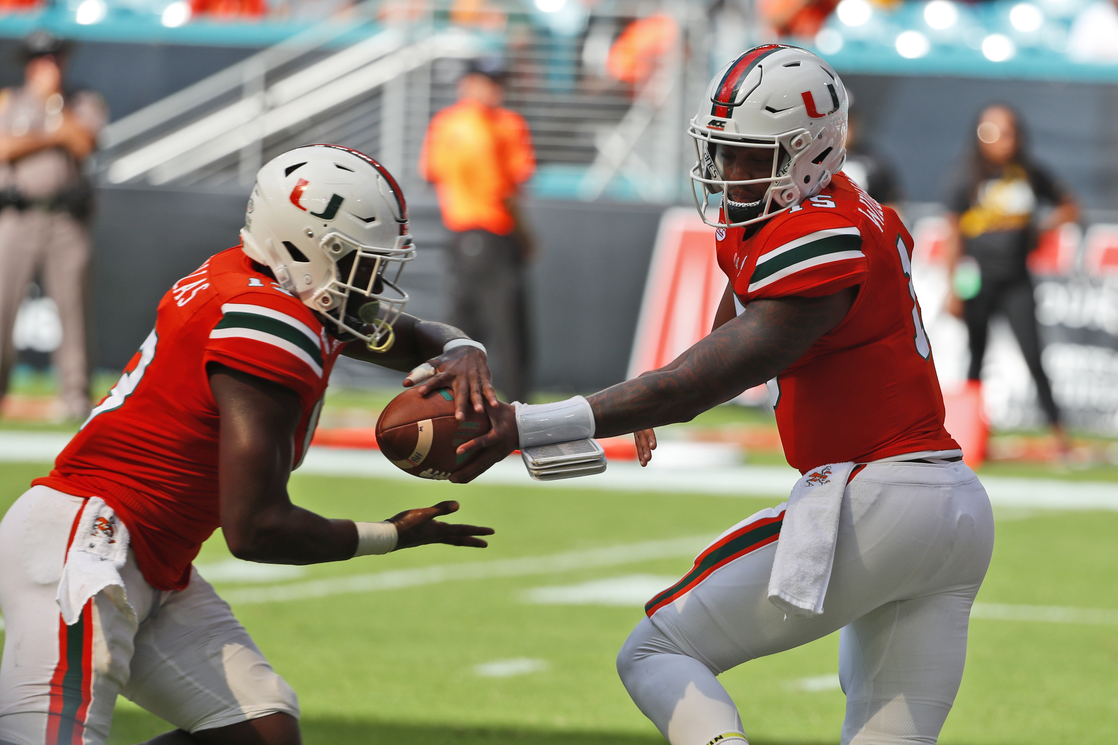 Miami running back DeeJay Dallas, left, takes a handoff from quarterback Jarren Williams (15) against Bethune Cookman last Saturday. Wilfredo Lee | AP Miami running back DeeJay Dallas, left, takes a handoff from quarterback Jarren Williams (15) against Bethune Cookman last Saturday. Wilfredo Lee | AP
