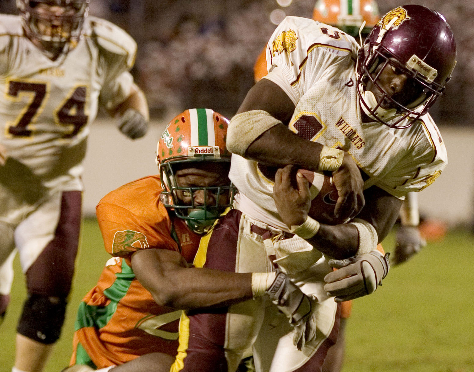 Bethune-Cookman running back Rodney Johnson drags Florida A&M defensive back O'Bryan Brandy with him into the end zone to score in overtime Nov. 20, 2004, in Orlando. Bethune-Cookman won 58-52. (AP Photo/Scott Audette) Bethune-Cookman running back Rodney Johnson drags Florida A&M defensive back O'Bryan Brandy with him into the end zone to score in overtime Nov. 20, 2004, in Orlando. Bethune-Cookman won 58-52. (AP Photo/Scott Audette)