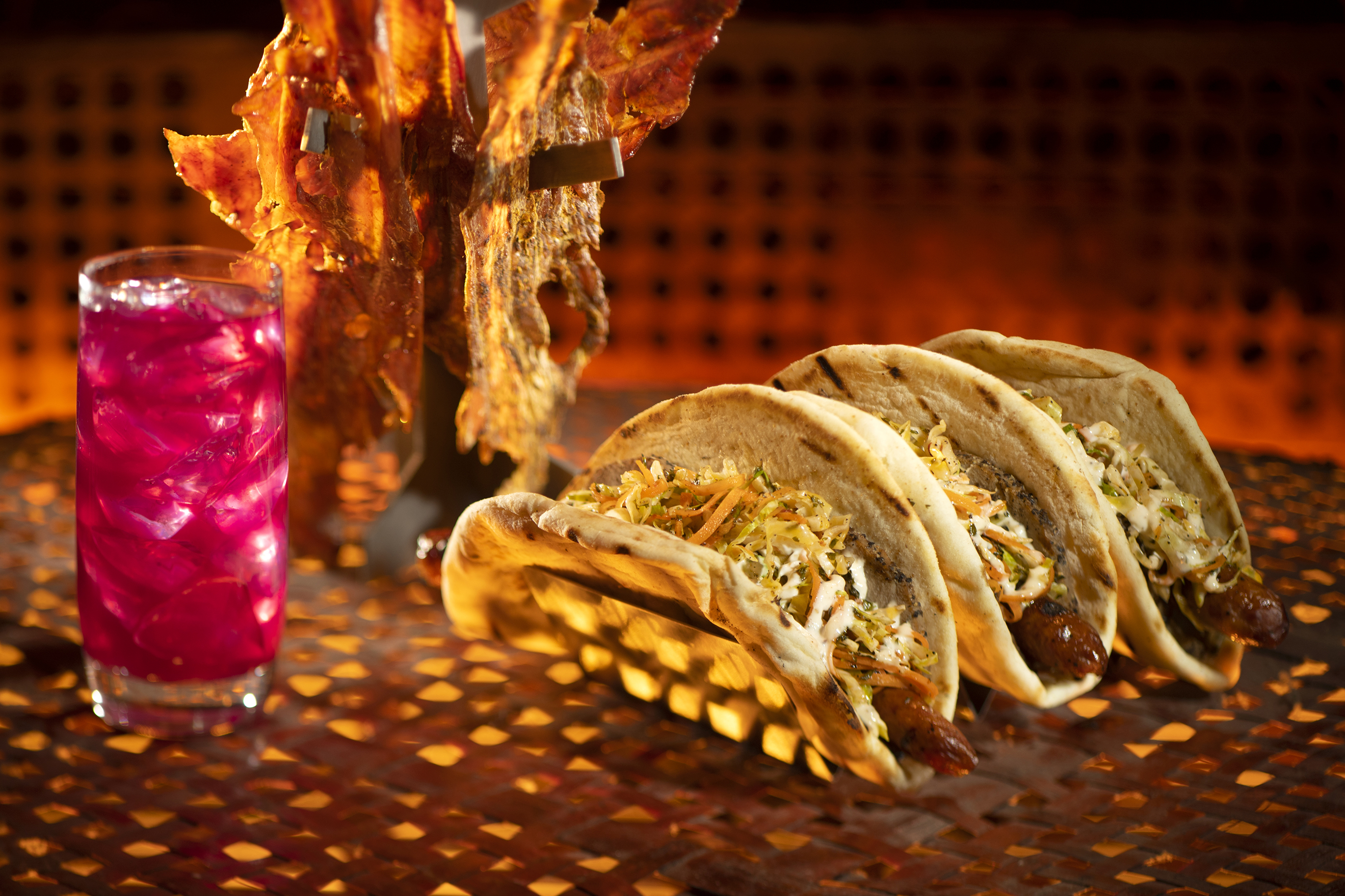 At Disney's Hollywood Studios pictured left to right, are the Meiloorun Juice, the Turkey Jerky and the Ronto Wrap filled with spiced grilled sausage and roasted pork found at Ronto Roasters, located in the Black Spire Outpost market inside Star Wars: Galaxy's Edge. (Kent Phillips/Disney Parks) Walt Disney World At Disney's Hollywood Studios pictured left to right, are the Meiloorun Juice, the Turkey Jerky and the Ronto Wrap filled with spiced grilled sausage and roasted pork found at Ronto Roasters, located in the Black Spire Outpost market inside Star Wars: Galaxy's Edge. (Kent Phillips/Disney Parks) Walt Disney World