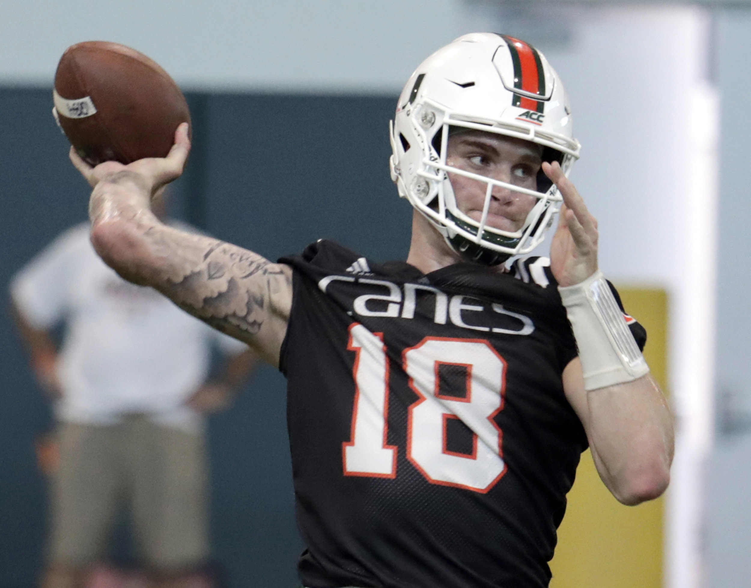 In this April 18, 2019, file photo, Miami quarterback Tate Martell (18) throws during NCAA college football spring practice, in Coral Gables. (AP Photo/Lynne Sladky, File) In this April 18, 2019, file photo, Miami quarterback Tate Martell (18) throws during NCAA college football spring practice, in Coral Gables. (AP Photo/Lynne Sladky, File)