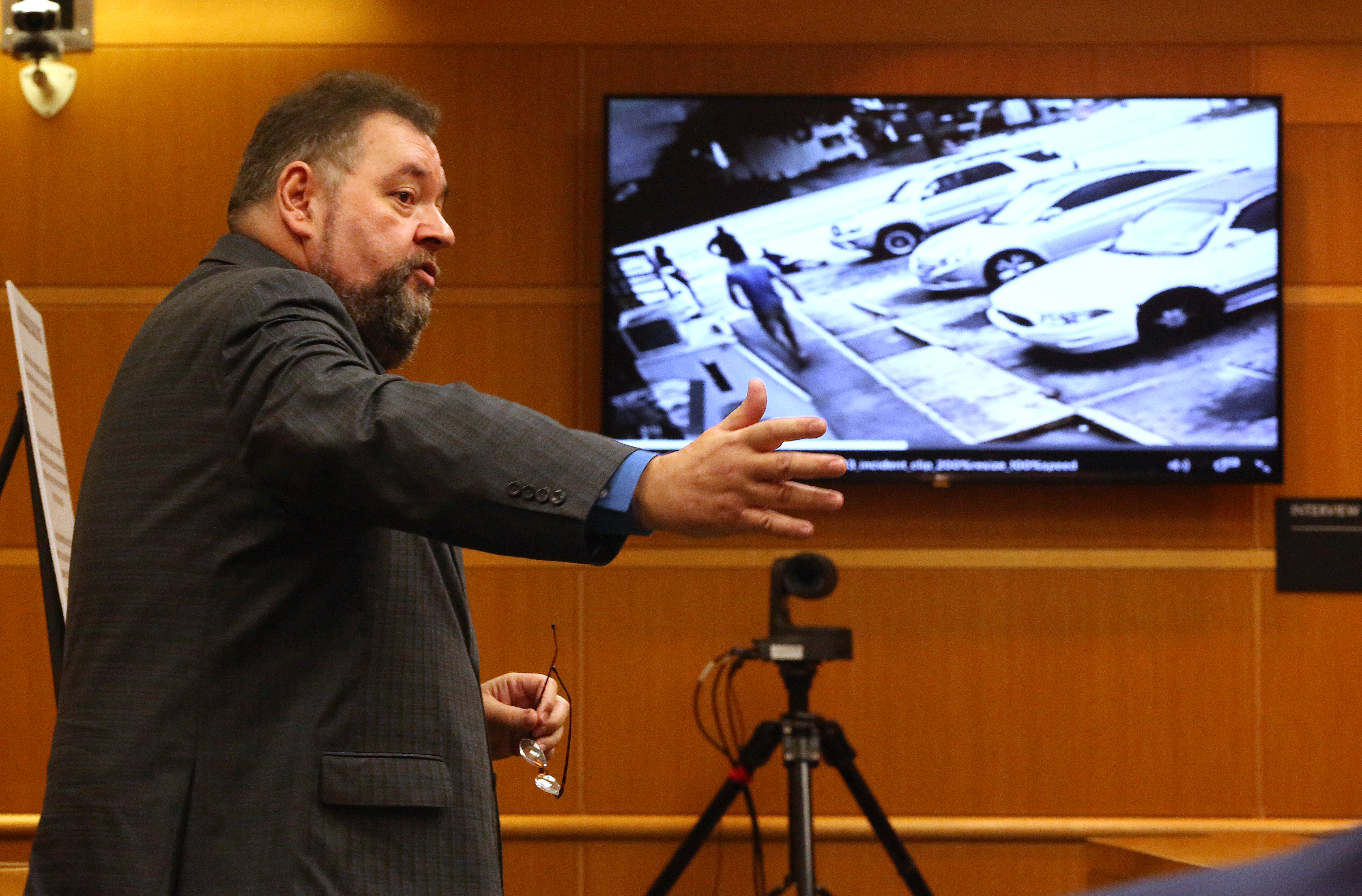 Defense attorney John Trevena addresses members of the jury during closing arguments Friday in the Michael Drejka manslaughter trial in Pinellas County. A video of the shooting of victim Markeis McGlockton by defendant Michael Drejka at the Circle A Food Mart near Clearwater in July 2018 can be seen in the background. SCOTT KEELER | Times Defense attorney John Trevena addresses members of the jury during closing arguments Friday in the Michael Drejka manslaughter trial in Pinellas County. A video of the shooting of victim Markeis McGlockton by defendant Michael Drejka at the Circle A Food Mart near Clearwater in July 2018 can be seen in the background. SCOTT KEELER | Times