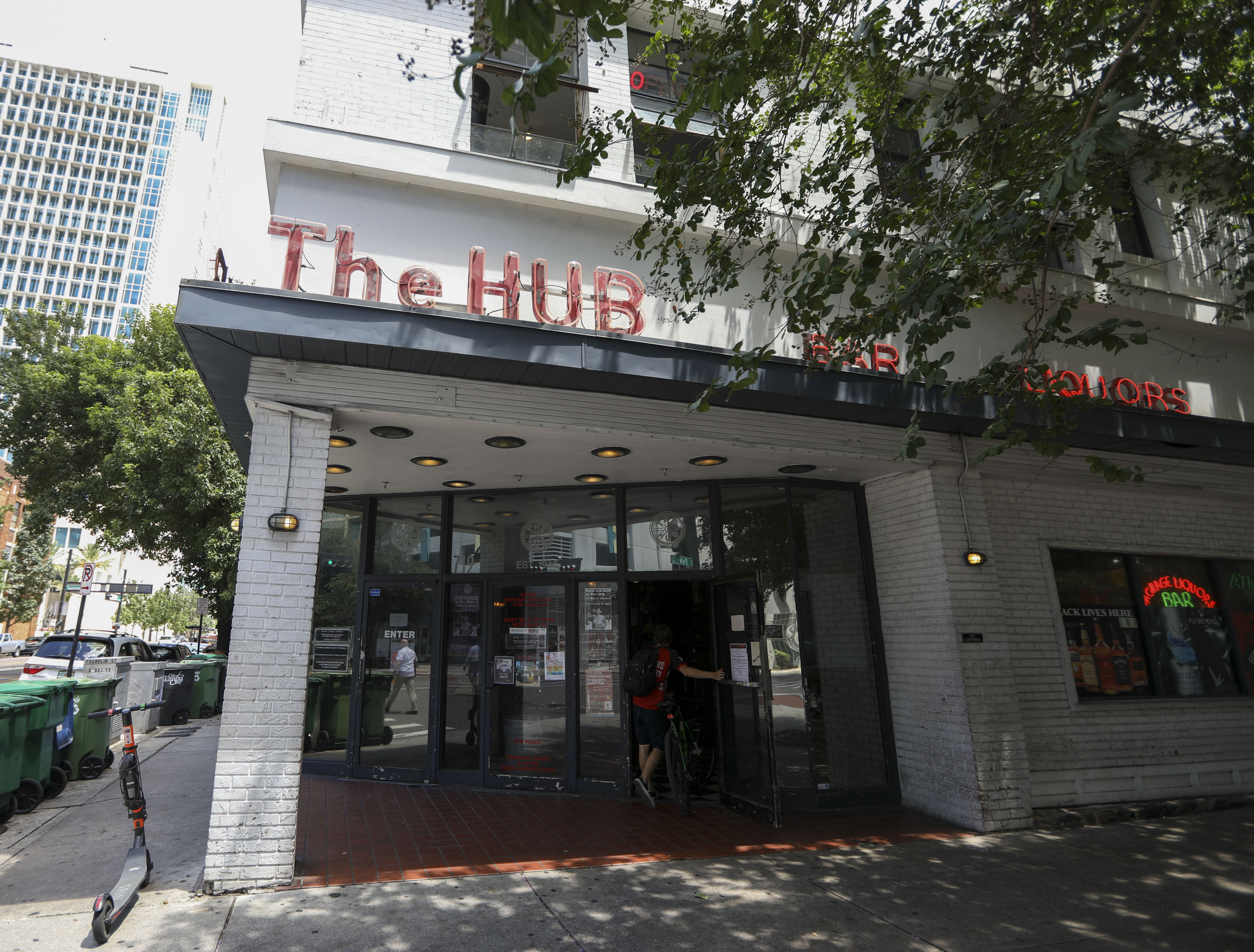 A patron walks into The Hub located at 719 N Franklin Street. The iconic Tampa bar is celebrating its 70th year. CHRIS URSO | Times A patron walks into The Hub located at 719 N Franklin Street. The iconic Tampa bar is celebrating its 70th year. CHRIS URSO | Times