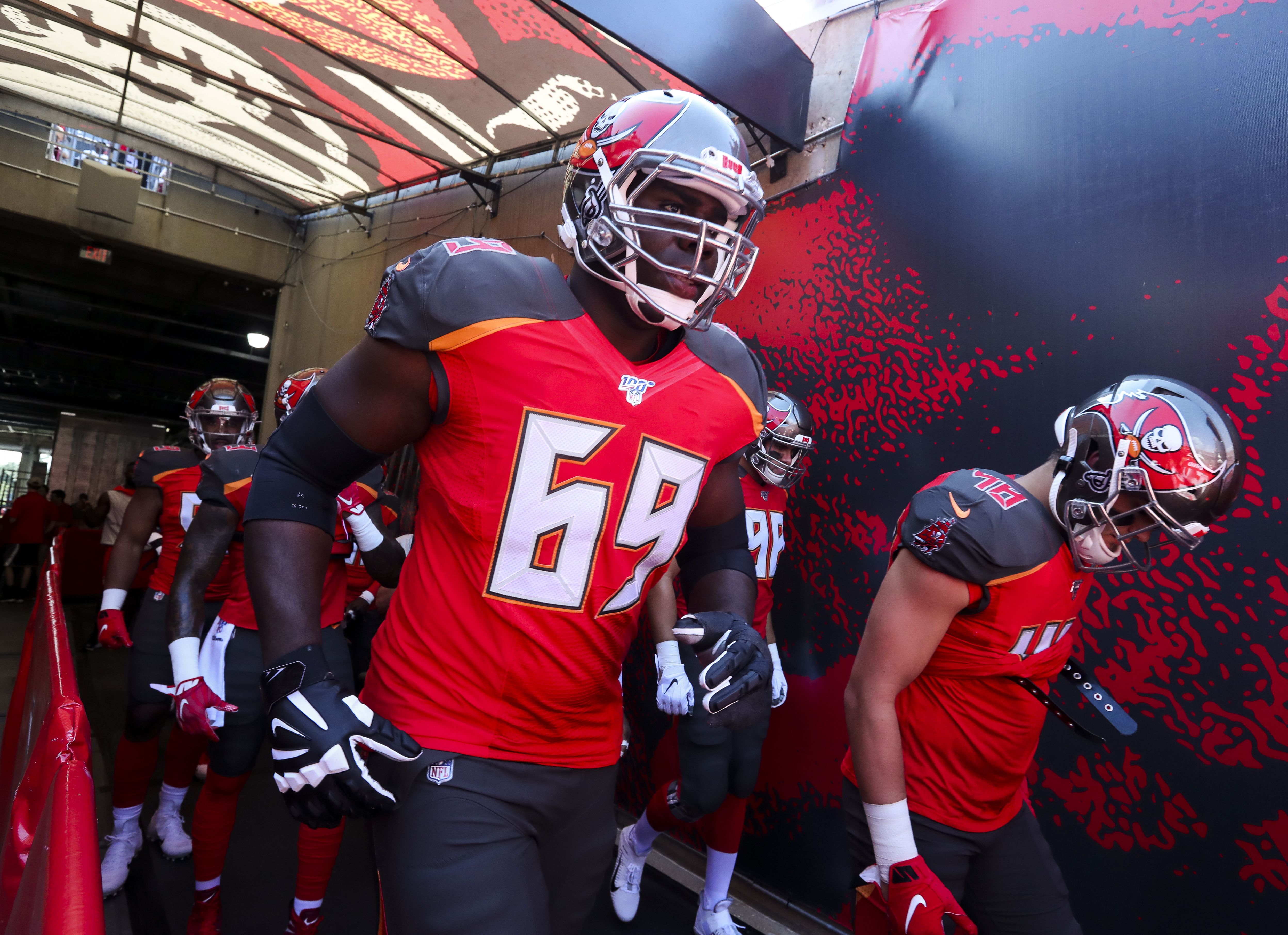 Tampa Bay Buccaneers tackle Demar Dotson (69) takes the field before the Tampa Bay Buccaneers game against the San Francisco 49ers at Raymond James Stadium on September 8, 2019 in Tampa, Florida. MONICA HERNDON | Times Tampa Bay Buccaneers tackle Demar Dotson (69) takes the field before the Tampa Bay Buccaneers game against the San Francisco 49ers at Raymond James Stadium on September 8, 2019 in Tampa, Florida. MONICA HERNDON | Times