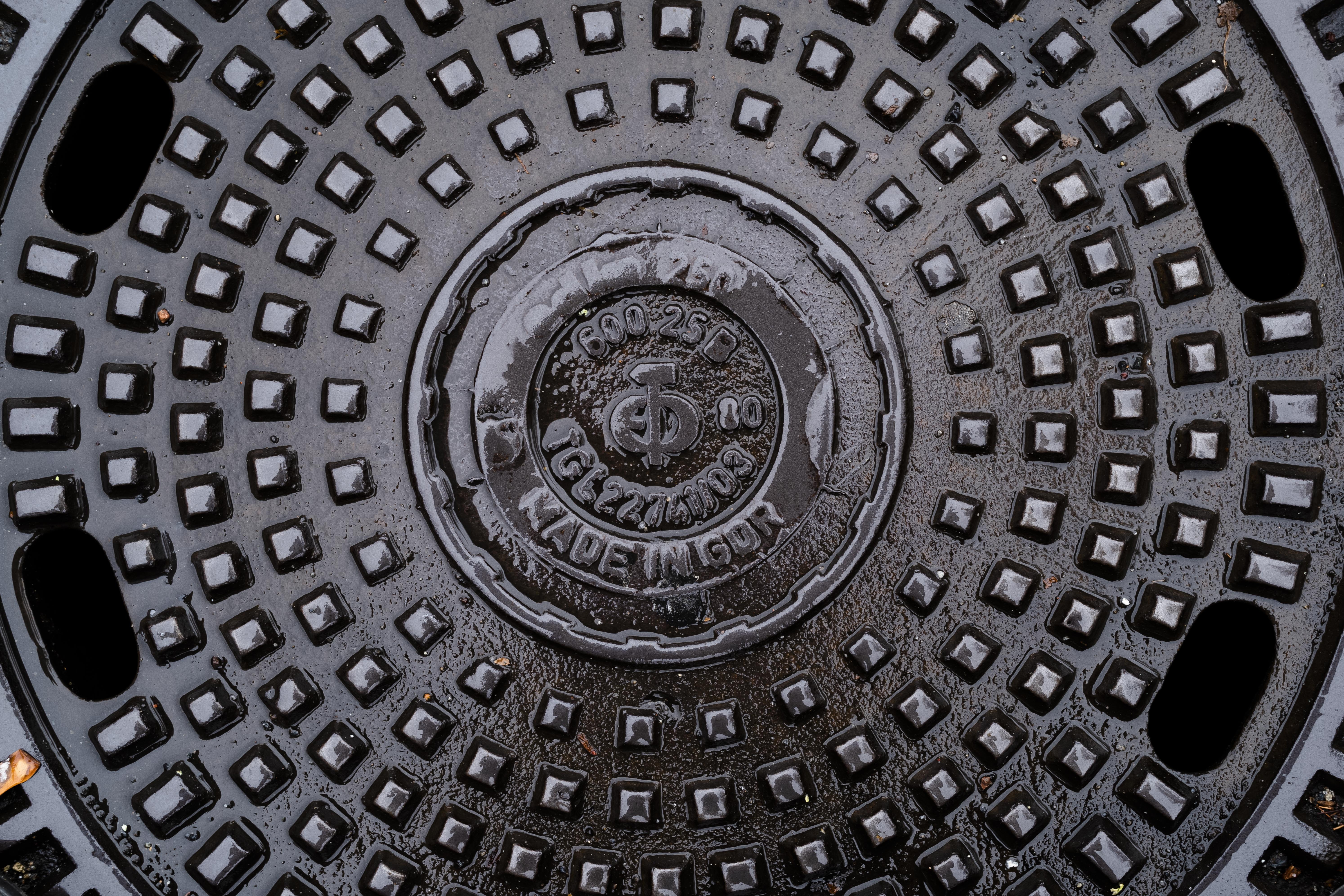 Some manhole covers have survived from communist times in Berlin, when Volkseigene Betriebe, or Publicly Owned Enterprises, manufactured manhole covers for East German streets. Markus Schreiber | AP Some manhole covers have survived from communist times in Berlin, when Volkseigene Betriebe, or Publicly Owned Enterprises, manufactured manhole covers for East German streets. Markus Schreiber | AP