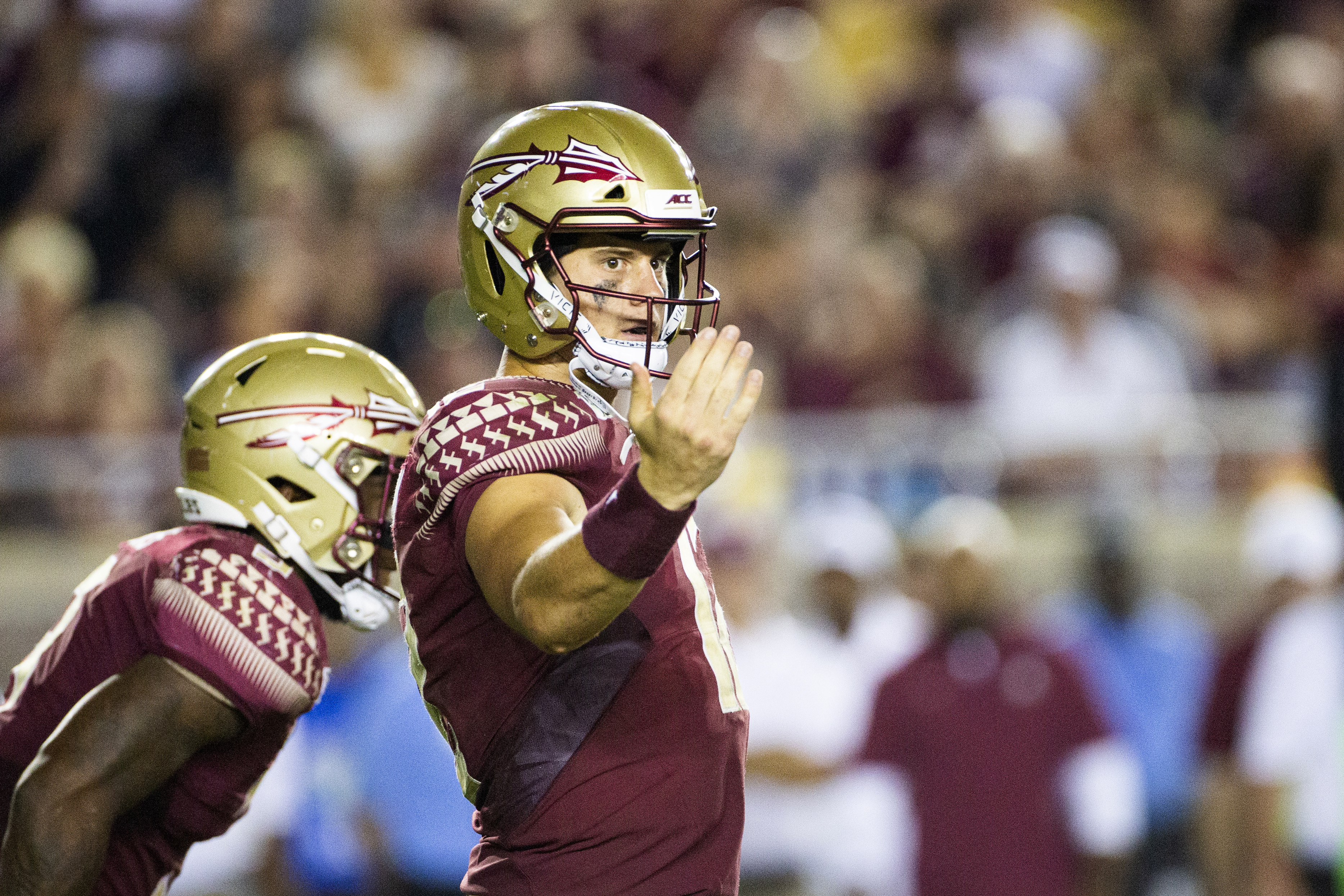 Florida State quarterback Alex Hornibrook (12) sets his receiver in action against North Carolina State in Tallahassee on Sept. 28. Mark Wallheiser | AP Florida State quarterback Alex Hornibrook (12) sets his receiver in action against North Carolina State in Tallahassee on Sept. 28. Mark Wallheiser | AP
