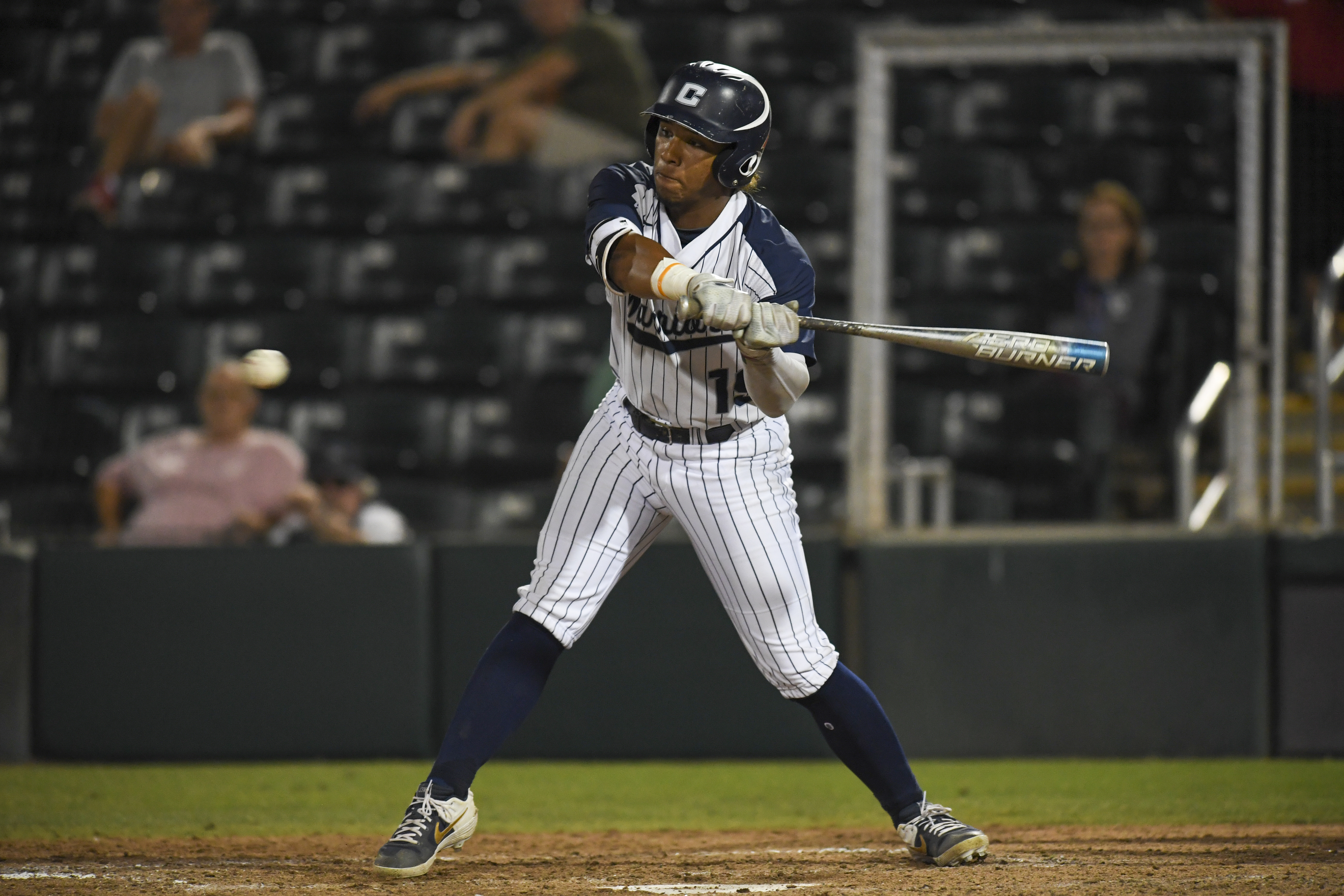 Calvary Christian's Charles Stevens (19) hits a single, allowing Peter Stavrakos (12) to score the winning run. (ALLIE GOULDING | Times) Calvary Christian's Charles Stevens (19) hits a single, allowing Peter Stavrakos (12) to score the winning run. (ALLIE GOULDING | Times)