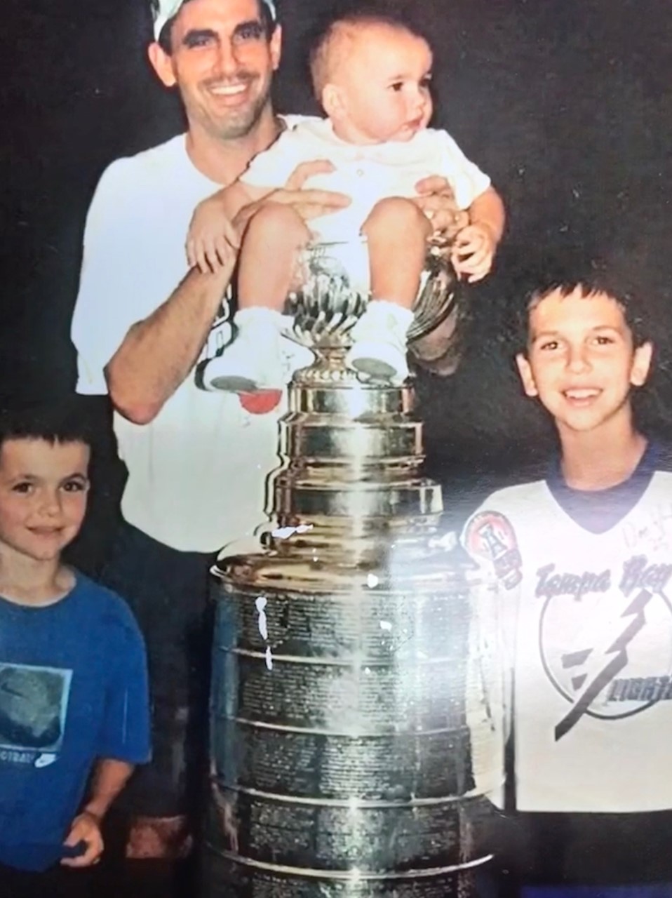 Wharton High coach Tommy Tonelli poses with the NHL's Stanley Cup in 2004 with his three children: Matthew, Allie (in the cup) and Thomas. Photo courtesy of Tommy Tonelli Wharton High coach Tommy Tonelli poses with the NHL's Stanley Cup in 2004 with his three children: Matthew, Allie (in the cup) and Thomas. Photo courtesy of Tommy Tonelli