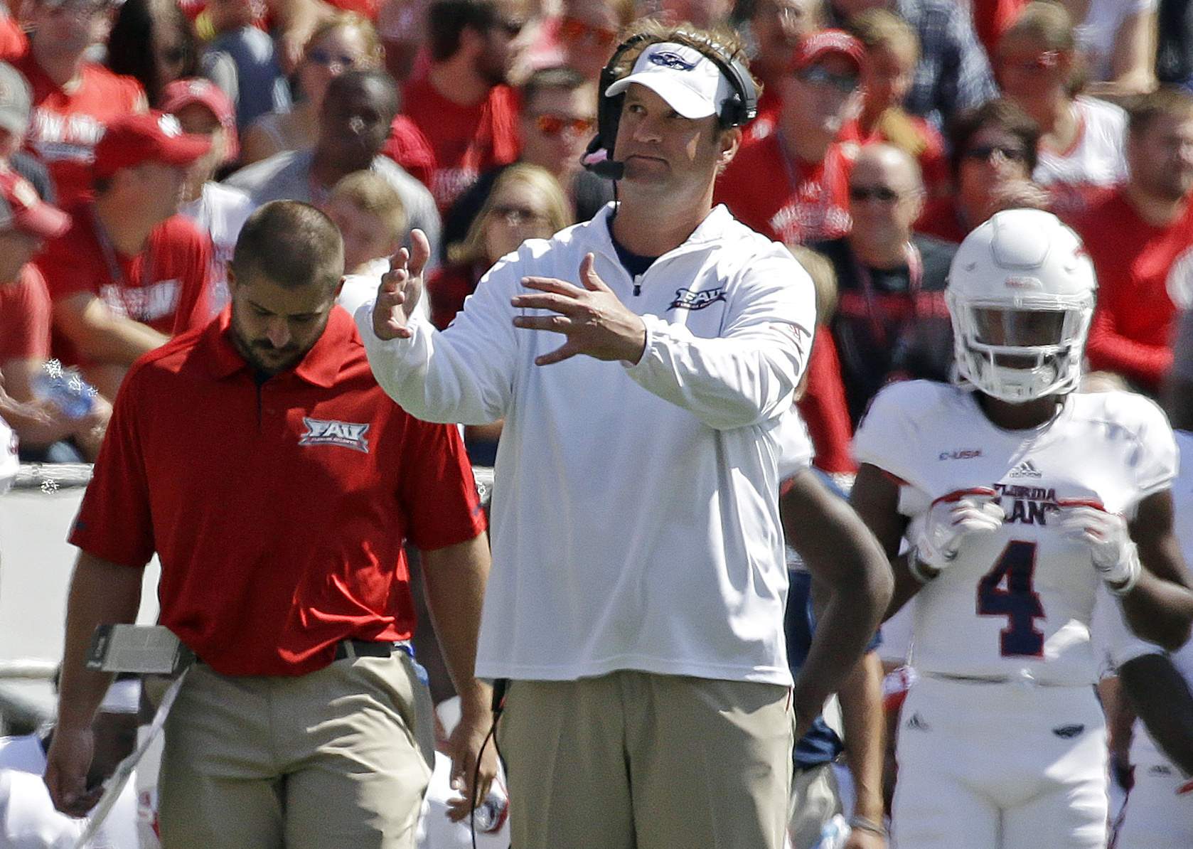 In this Sept. 9, 2017, file photo, Florida Atlantic coach Lane Kiffin gestures from the sidelines during a game against Wisconsin. In this Sept. 9, 2017, file photo, Florida Atlantic coach Lane Kiffin gestures from the sidelines during a game against Wisconsin.