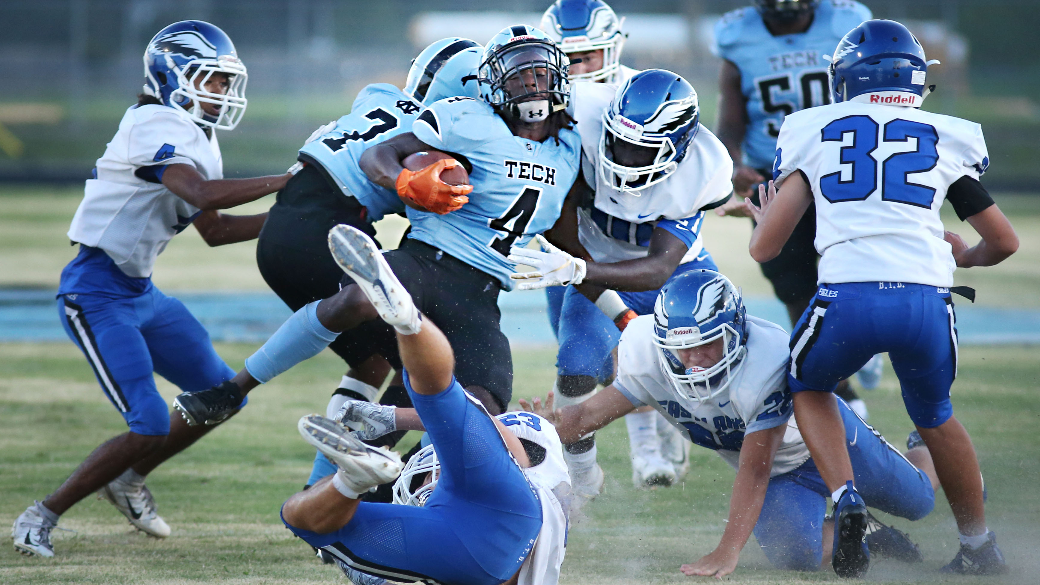 Nature Coast senior Lenkel Smith gets swarmed by East Lake defenders during first-half action Friday night. SCOTT PURKS | Special to the Times Nature Coast senior Lenkel Smith gets swarmed by East Lake defenders during first-half action Friday night. SCOTT PURKS | Special to the Times