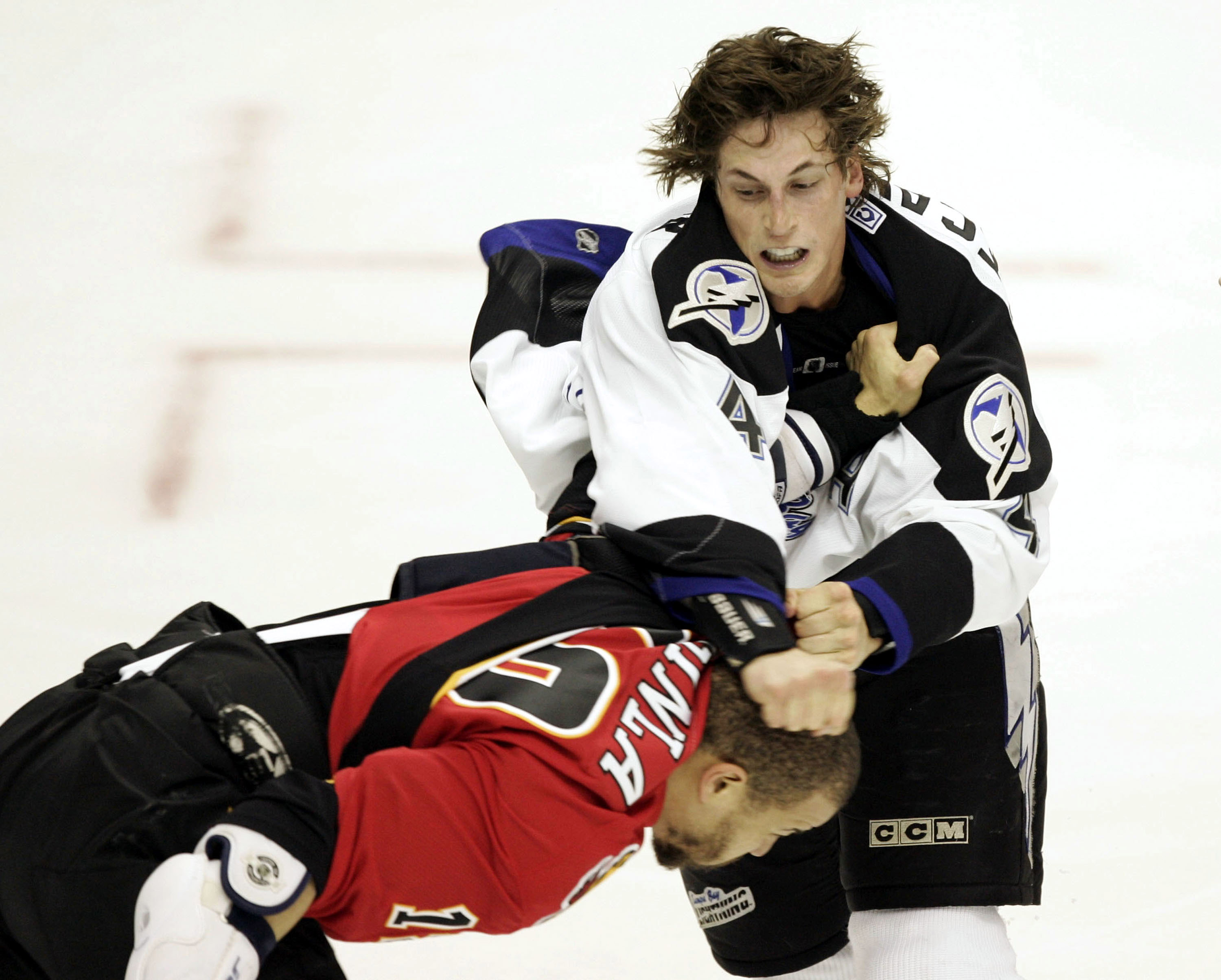 Vinny Lecavalier of the Tampa Bay Lightning throws a punch at Jarome Iginla of the Calgary Flames in Game 3 of the NHL Stanley Cup Finals on May 29, 2004, in Calgary, Alberta.(Photo by Brian Bahr/Getty Images) Vinny Lecavalier of the Tampa Bay Lightning throws a punch at Jarome Iginla of the Calgary Flames in Game 3 of the NHL Stanley Cup Finals on May 29, 2004, in Calgary, Alberta.(Photo by Brian Bahr/Getty Images)