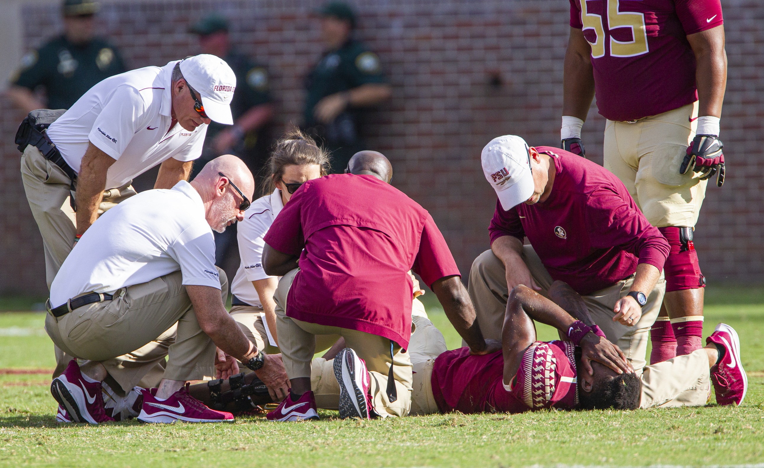 Trainers and doctors check on Florida State quarterback James Blackman (1), who left the game in the second half. Mark Wallheiser | AP Trainers and doctors check on Florida State quarterback James Blackman (1), who left the game in the second half. Mark Wallheiser | AP