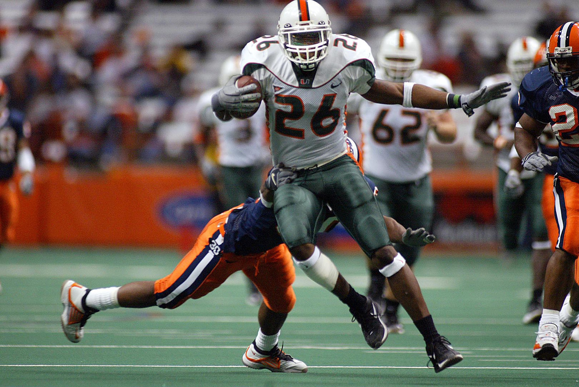 Miami's Sean Taylor scores a touchdown against Syracuse on a fake punt in the fourth quarter of a Nov. 30, 2002, game. (Joe Rimkus/Miami Herald) Miami's Sean Taylor scores a touchdown against Syracuse on a fake punt in the fourth quarter of a Nov. 30, 2002, game. (Joe Rimkus/Miami Herald)