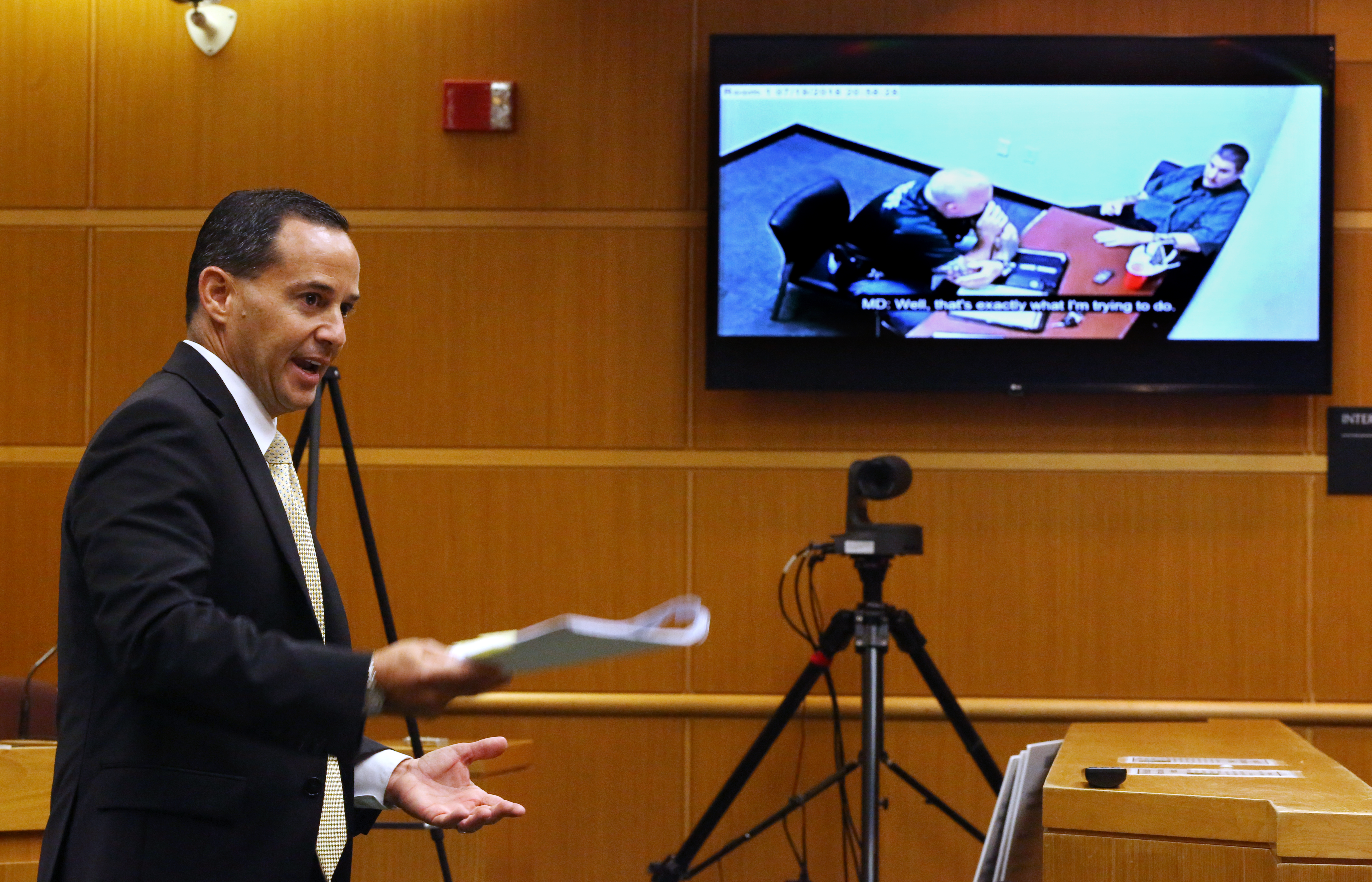 Assistant State Attorney Scott Rosenwasser shows the jury a video Friday of defendant Michael Drejka as he is interviewed by detectives. SCOTT KEELER | Times Assistant State Attorney Scott Rosenwasser shows the jury a video Friday of defendant Michael Drejka as he is interviewed by detectives. SCOTT KEELER | Times