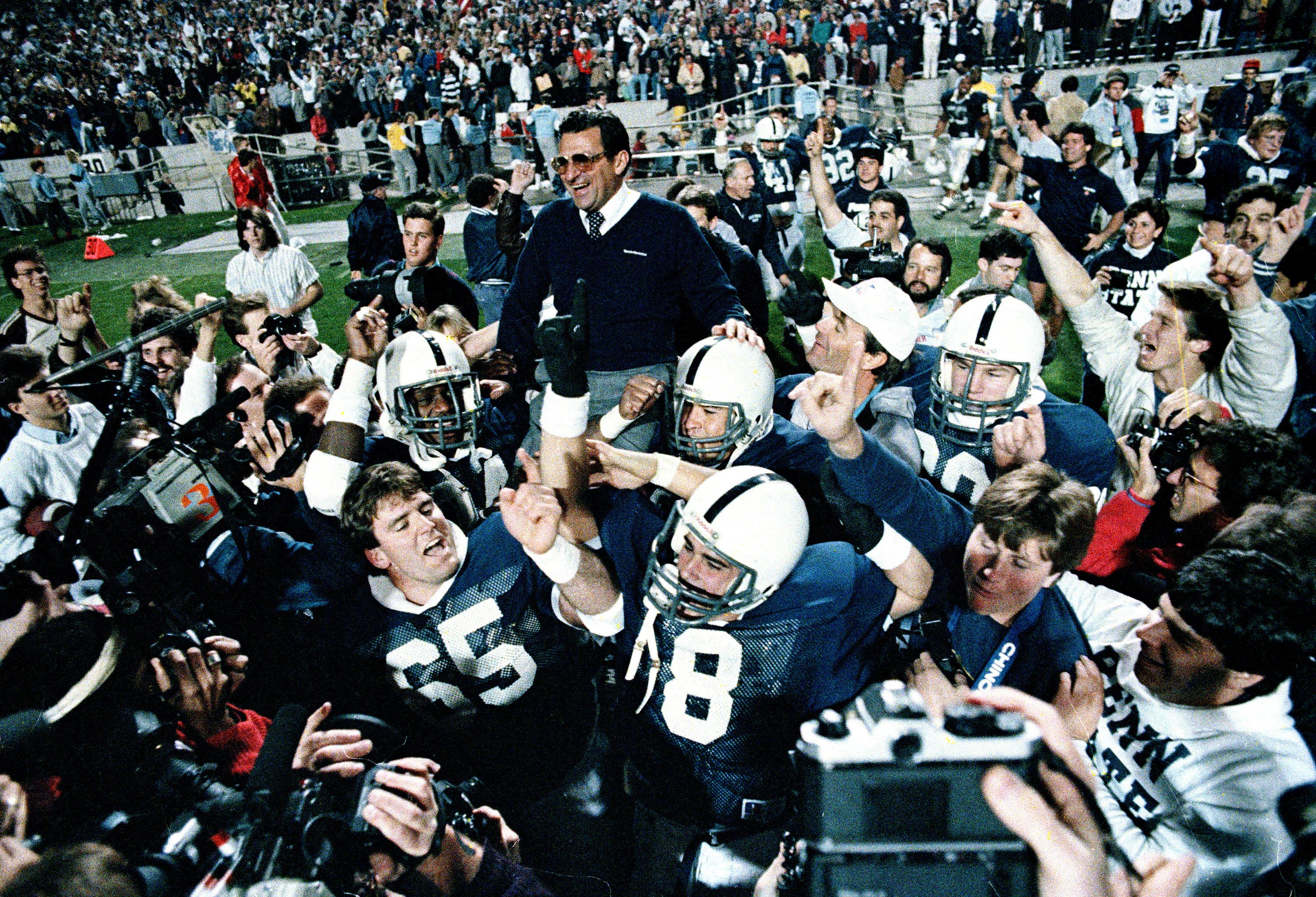 In this Jan. 2, 1987, file photo, Penn State coach Joe Paterno is carried after defeating Miami 14-10 in the Fiesta Bowl to win the national championship. (AP Photo/Jim Gerberich, File) In this Jan. 2, 1987, file photo, Penn State coach Joe Paterno is carried after defeating Miami 14-10 in the Fiesta Bowl to win the national championship. (AP Photo/Jim Gerberich, File)