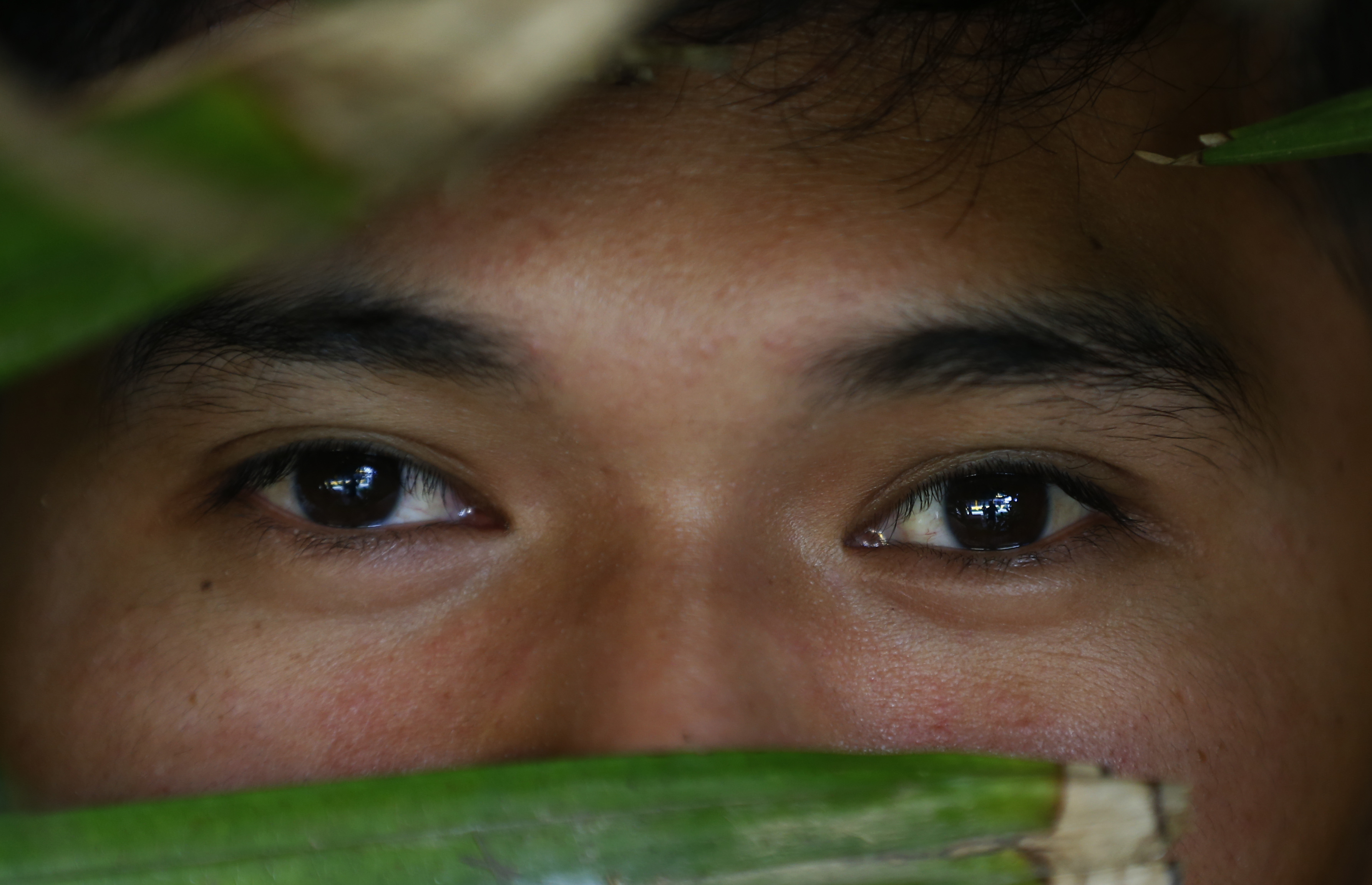 In this Jan. 27, 2019, photo, a former altar boy poses for a portrait in Talustusan on Biliran Island in the central Philippines. In December 2018, the 23-year-old went to the police and the village's Catholic parish priest Father Pius Hendricks was arrested and charged with child abuse. In this Jan. 27, 2019, photo, a former altar boy poses for a portrait in Talustusan on Biliran Island in the central Philippines. In December 2018, the 23-year-old went to the police and the village's Catholic parish priest Father Pius Hendricks was arrested and charged with child abuse.